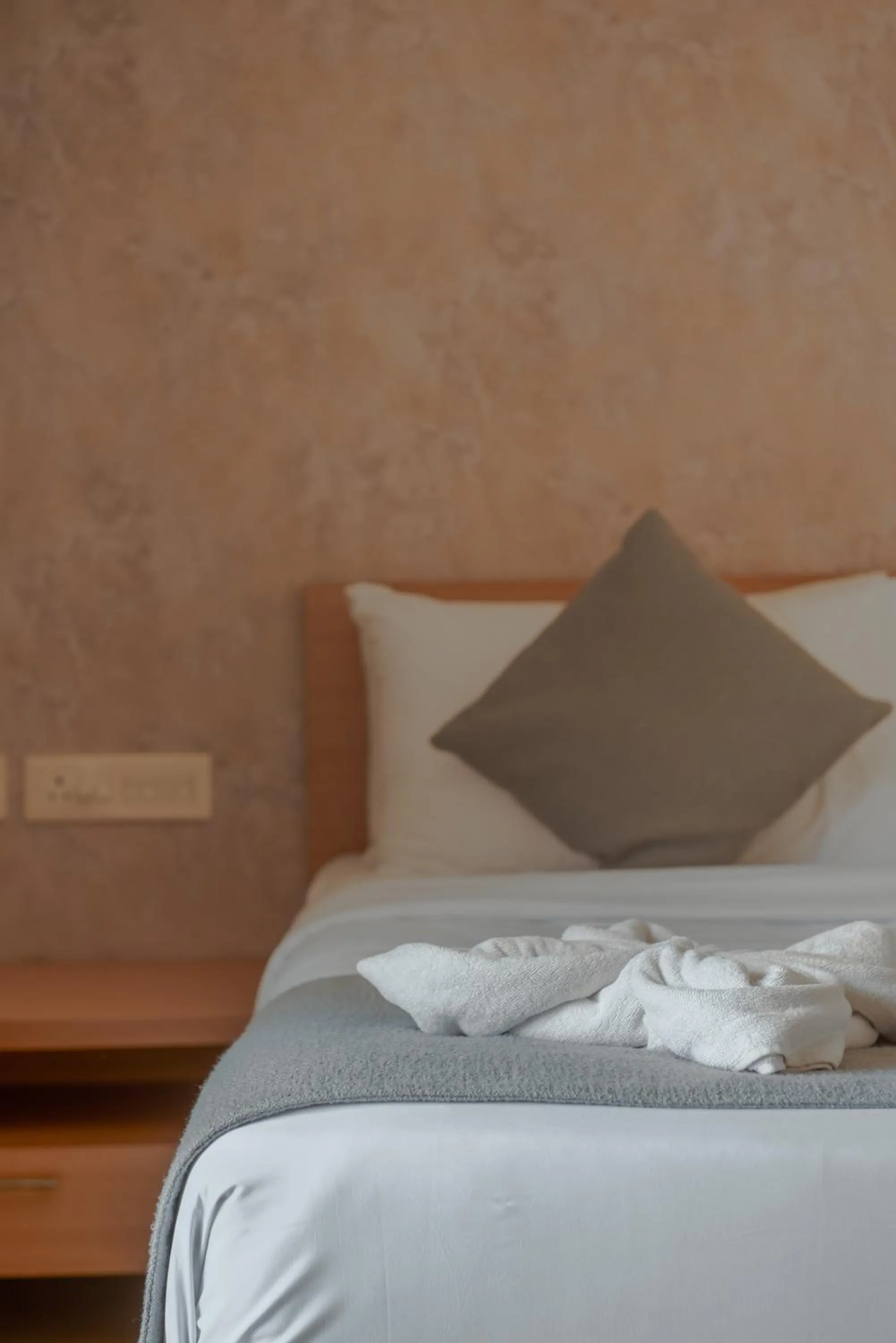 Bed in Hotel Shoolin Grand