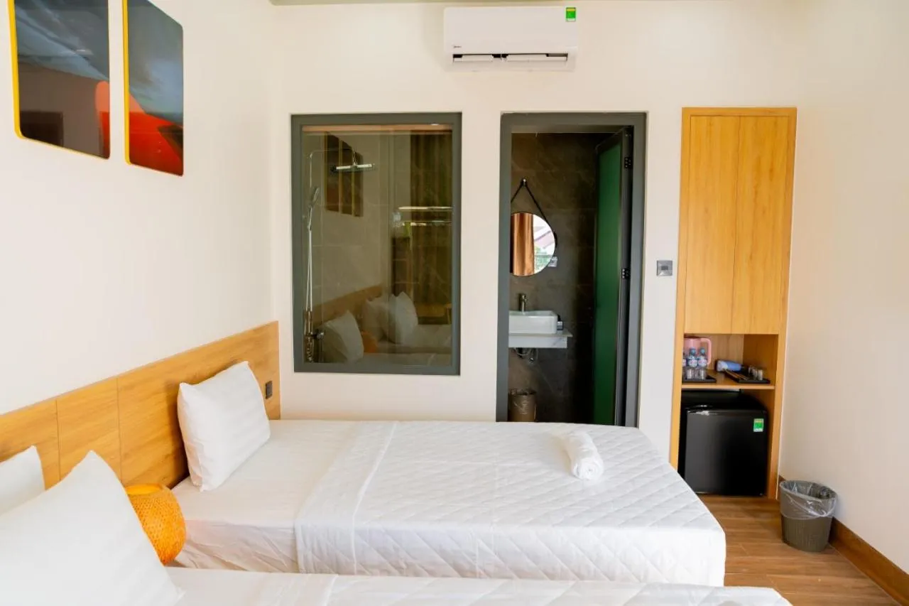 Bed in OSAKA BOUTIQUE PHAN THIET HOTEL