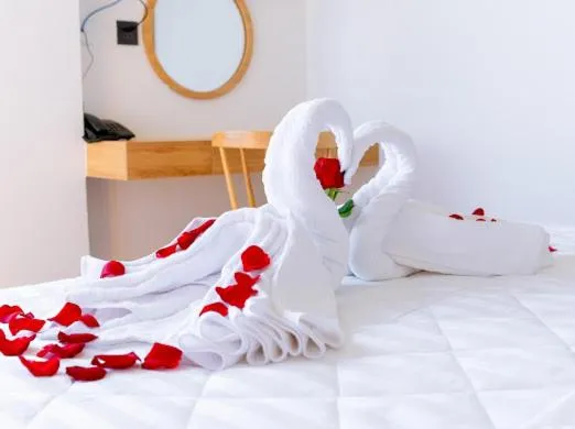 Bed in OSAKA BOUTIQUE PHAN THIET HOTEL