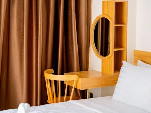 Bed in OSAKA BOUTIQUE PHAN THIET HOTEL