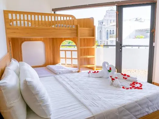 Bed in OSAKA BOUTIQUE PHAN THIET HOTEL