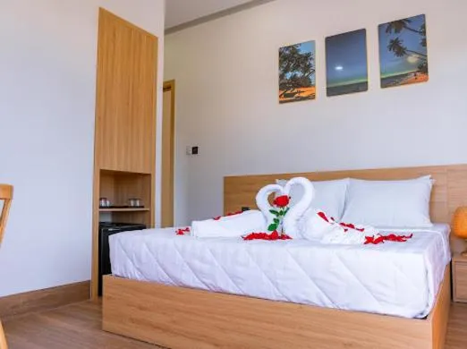 Bed in OSAKA BOUTIQUE PHAN THIET HOTEL