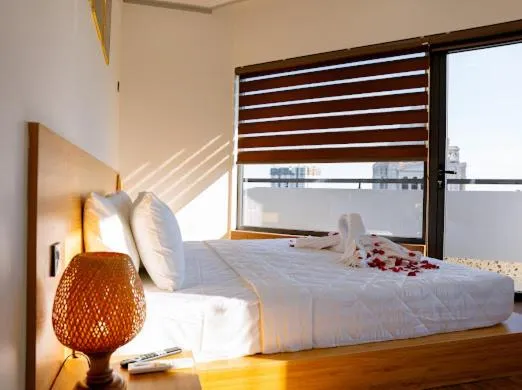 Bed in OSAKA BOUTIQUE PHAN THIET HOTEL