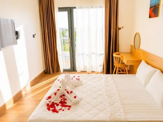 Bed in OSAKA BOUTIQUE PHAN THIET HOTEL