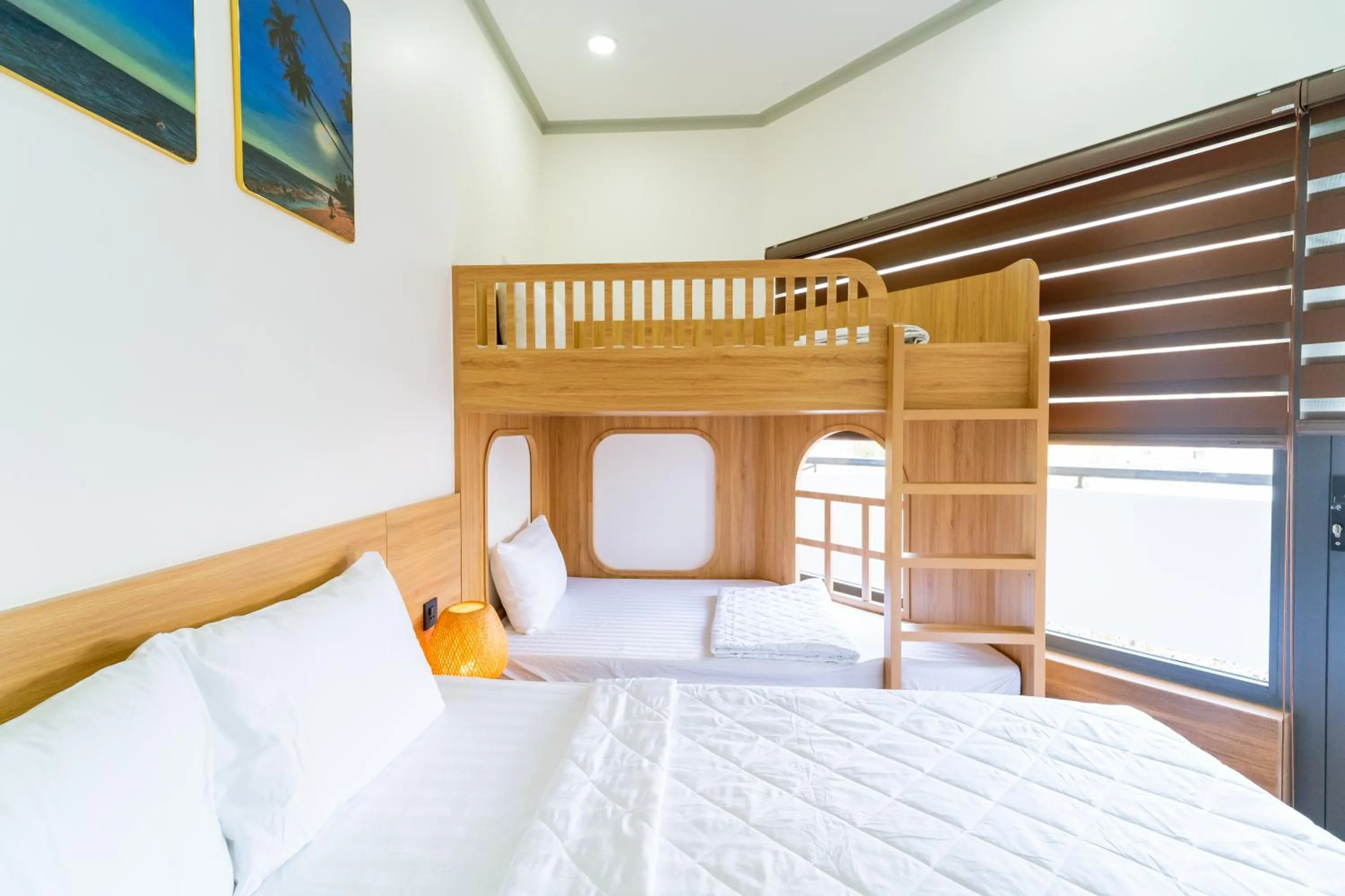 Bed in OSAKA BOUTIQUE PHAN THIET HOTEL