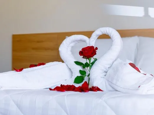 Bed in OSAKA BOUTIQUE PHAN THIET HOTEL