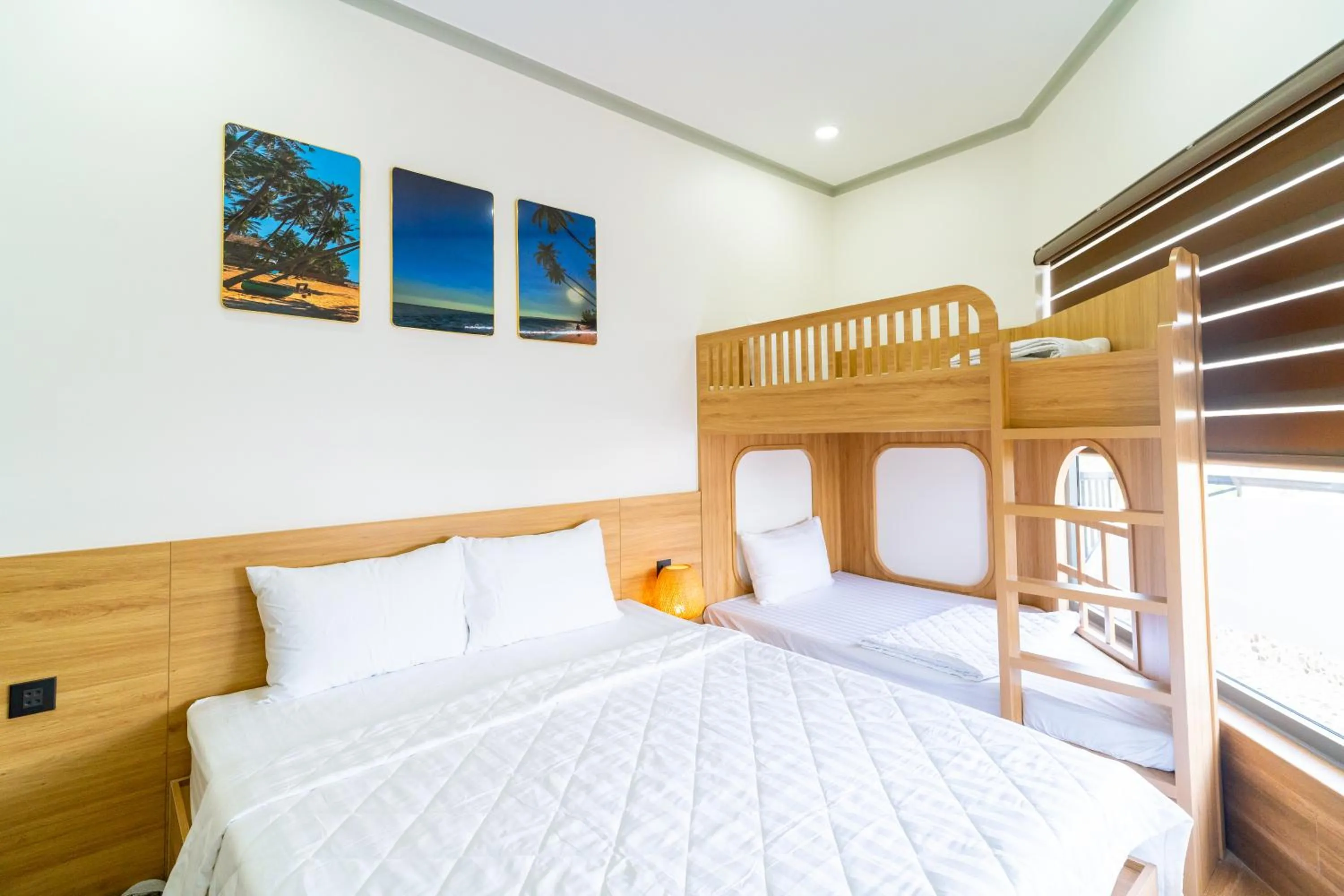 Bed in OSAKA BOUTIQUE PHAN THIET HOTEL