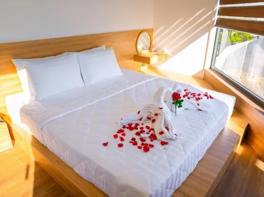 Bed in OSAKA BOUTIQUE PHAN THIET HOTEL