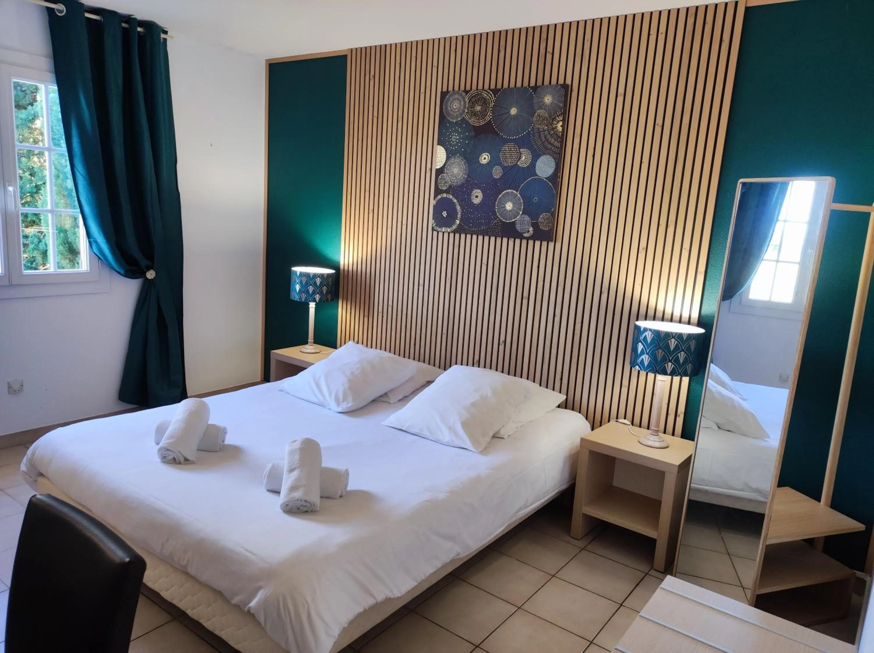 Photo of the whole room, Bed in Hôtel et Appart'Hôtel Le Relais Du Val D'Orbieu