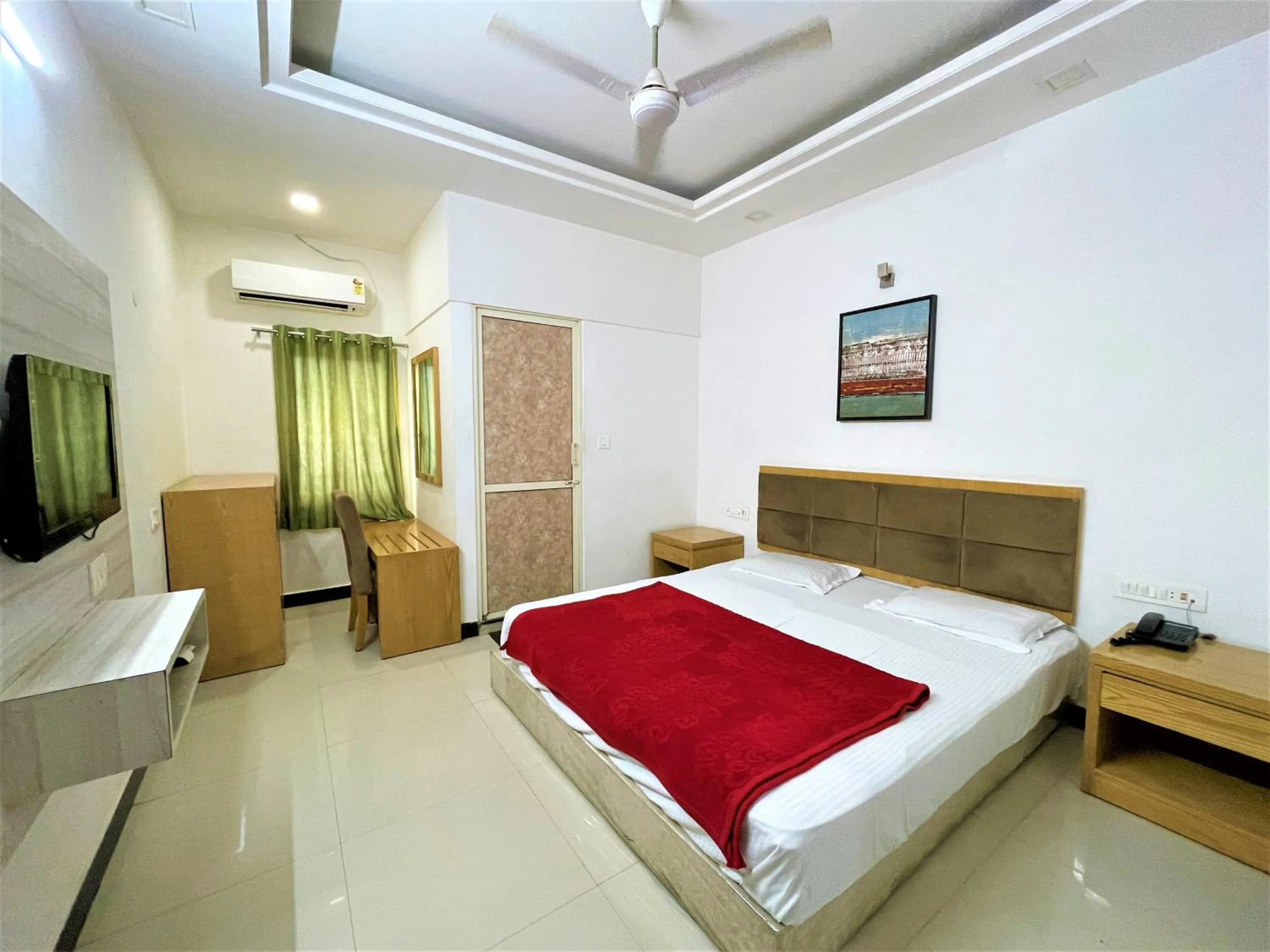 Bedroom, Bed in Stay Guru Usha Residency