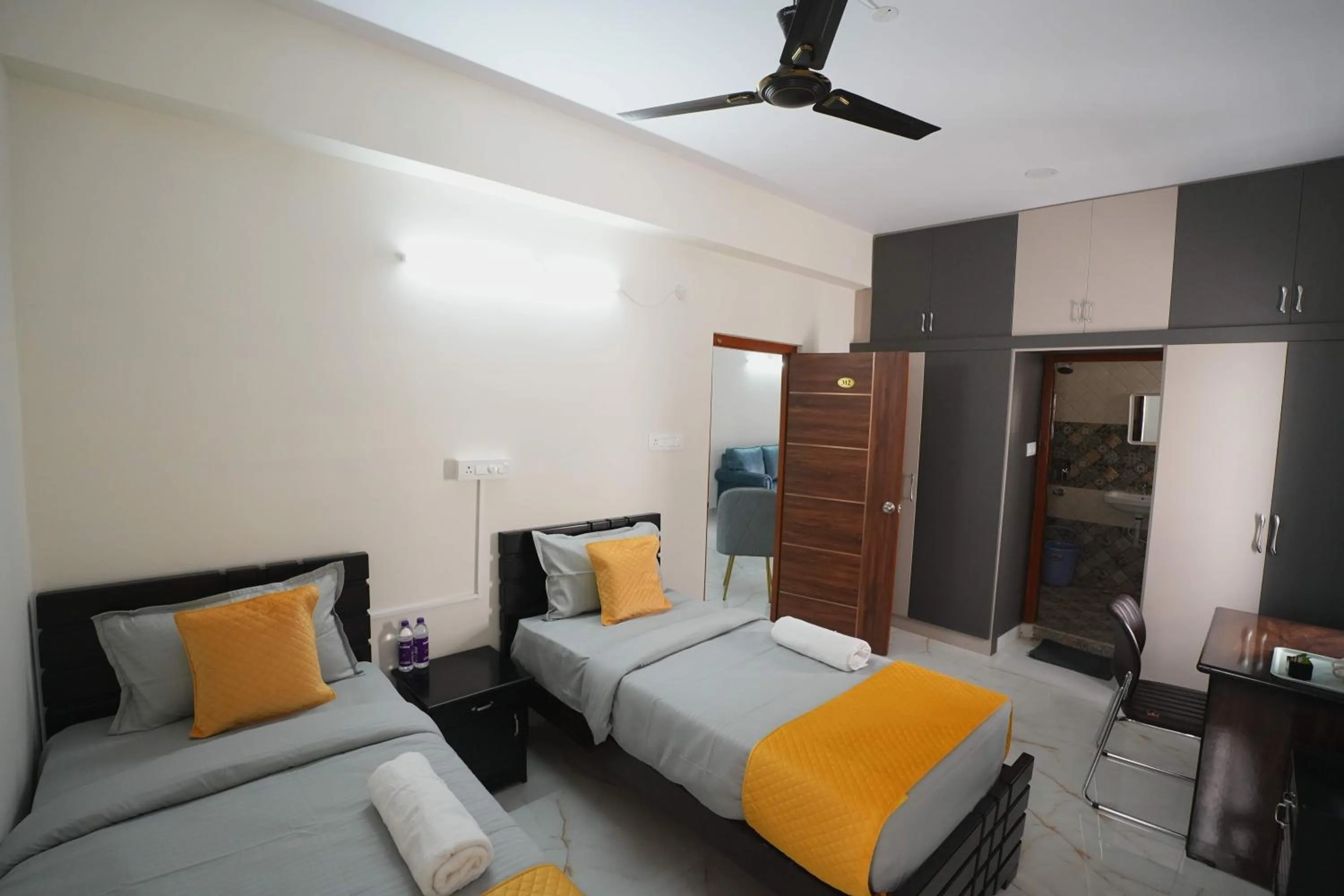 Bed in Yellow Bells Serviced Apartments Hitech City