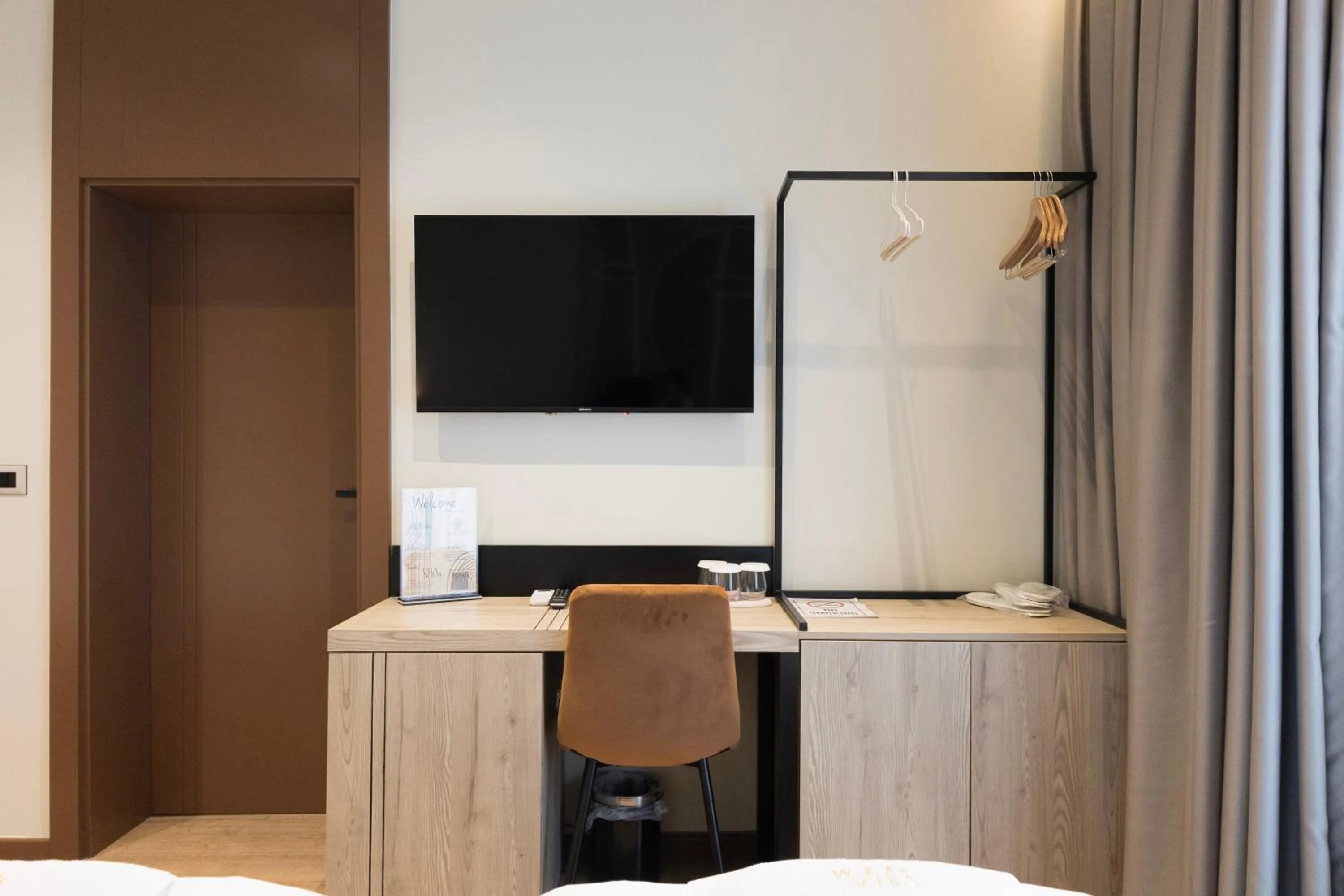 TV and multimedia, Bed in Villa Noem