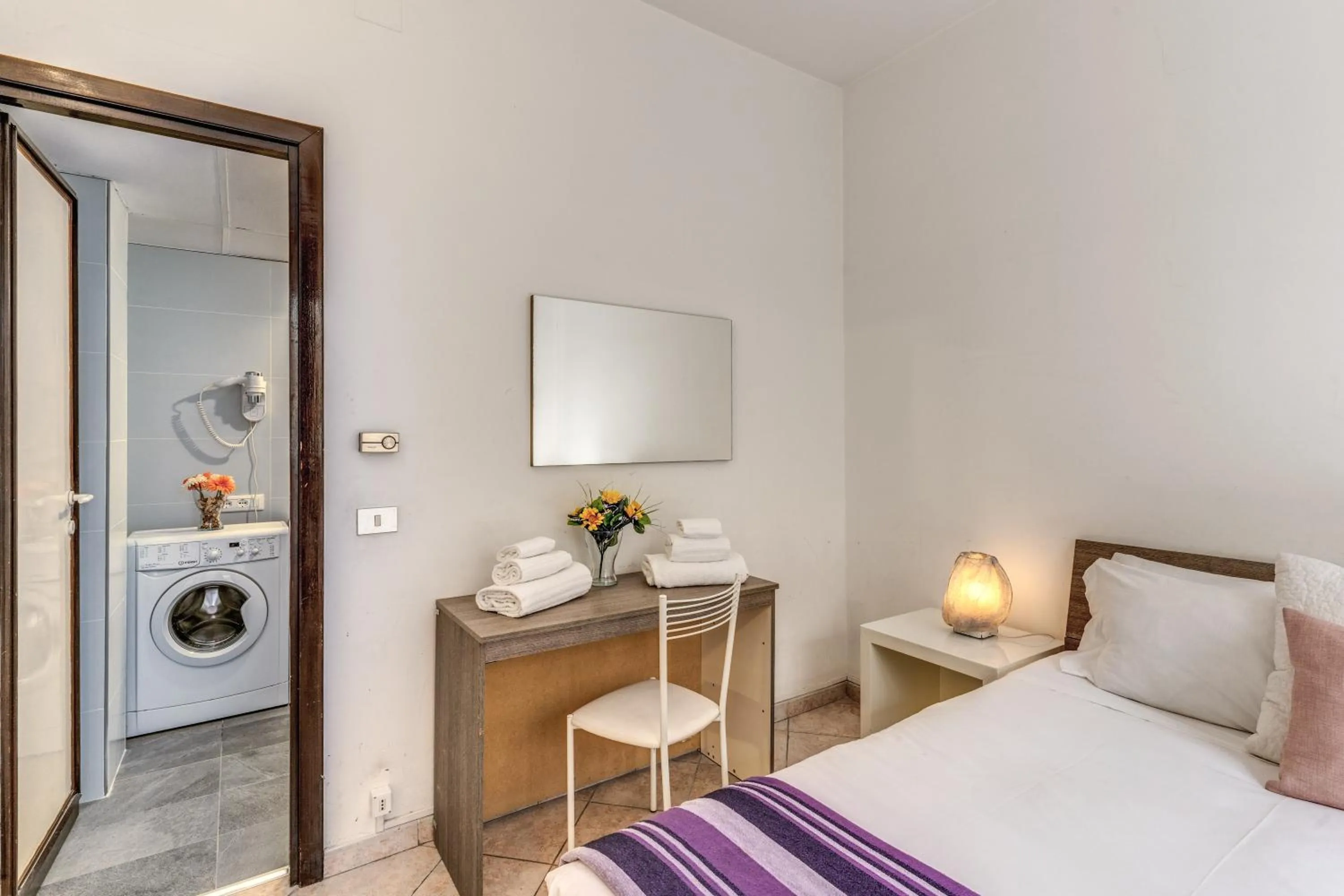 Bed in M&L Apartments - Ardesia Colosseo