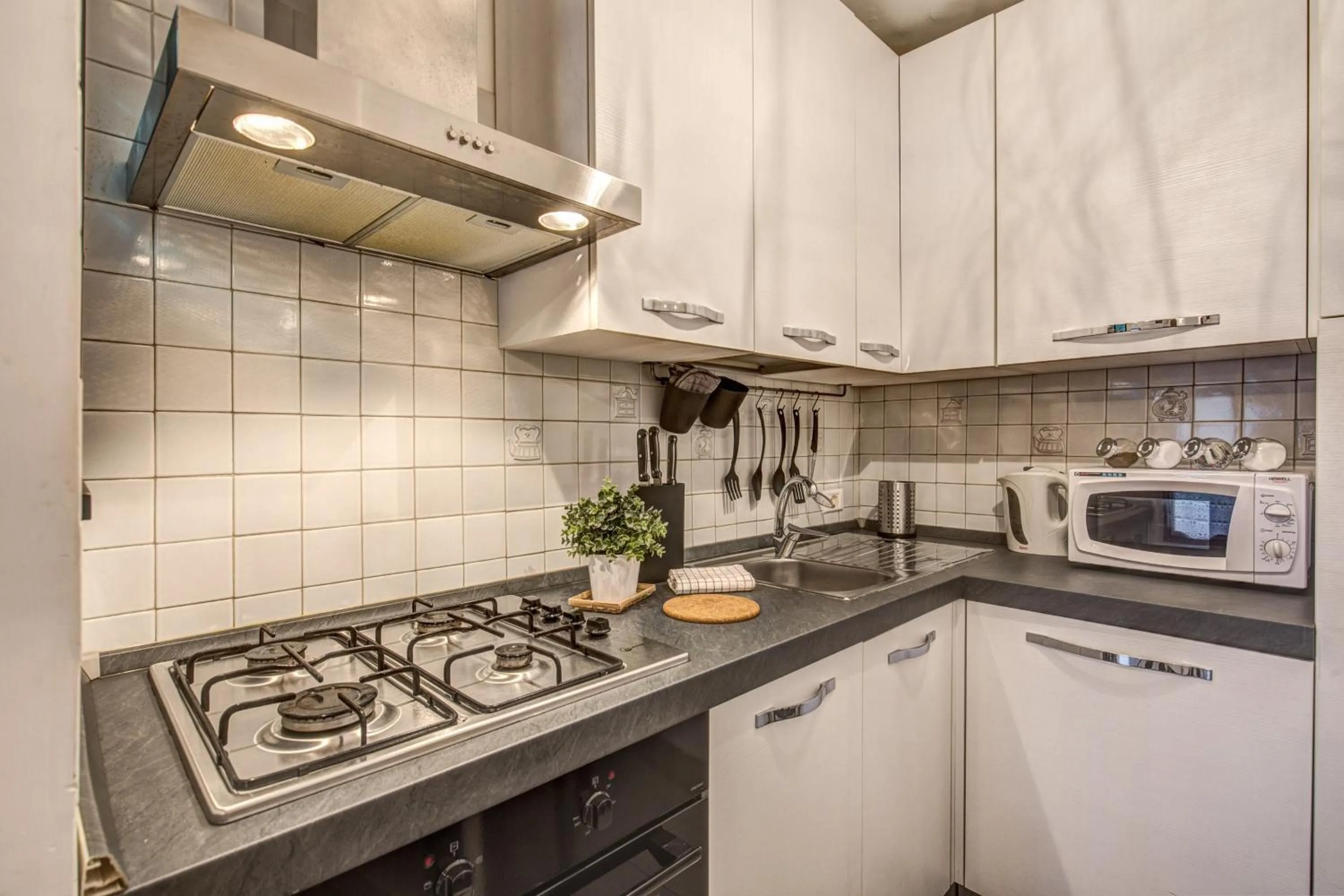 Kitchen or kitchenette in M&L Apartments - Ardesia Colosseo