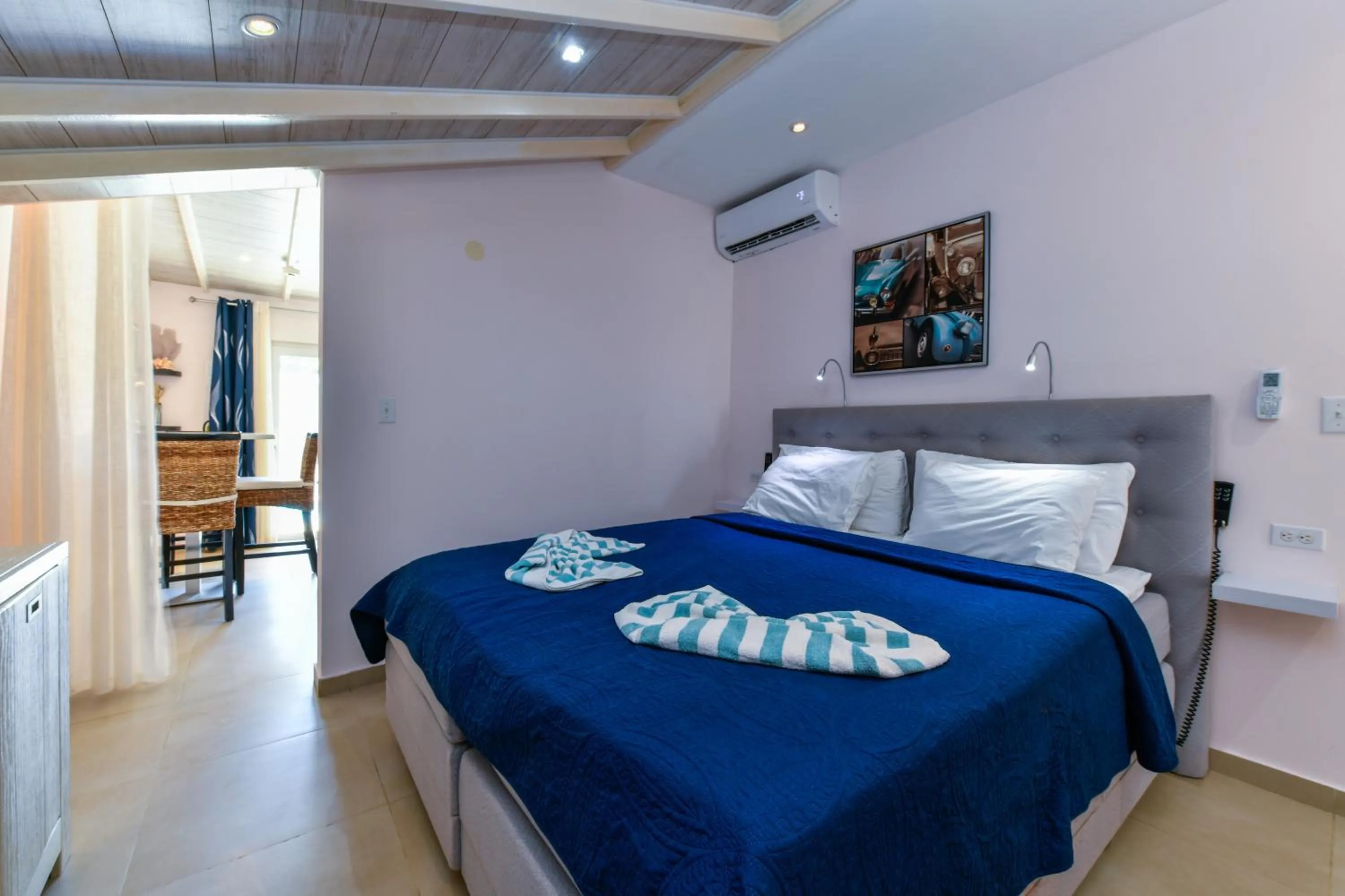 Bed in Boutique Hotel Swiss Paradise Aruba Villas and Suites