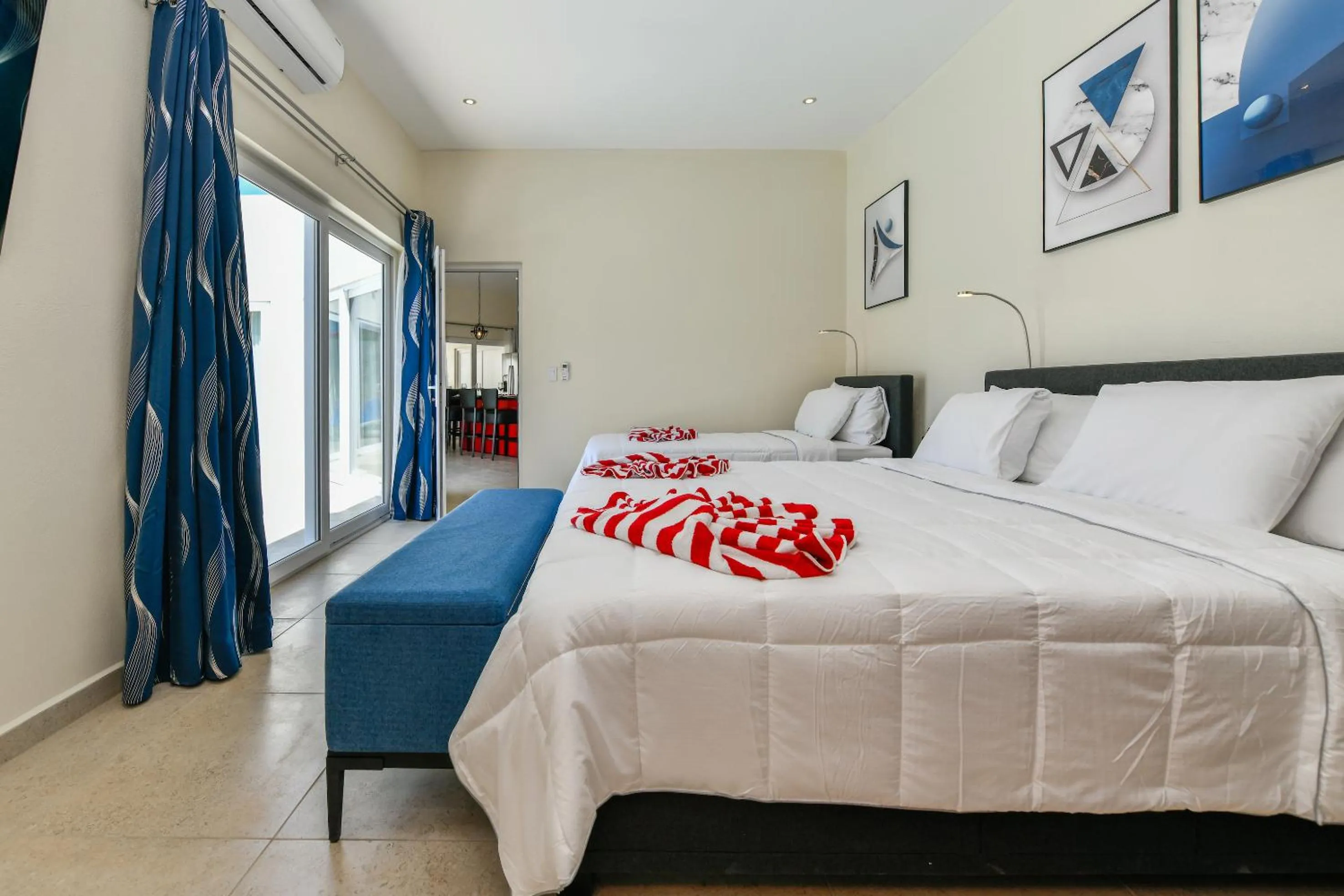 Bed in Boutique Hotel Swiss Paradise Aruba Villas and Suites