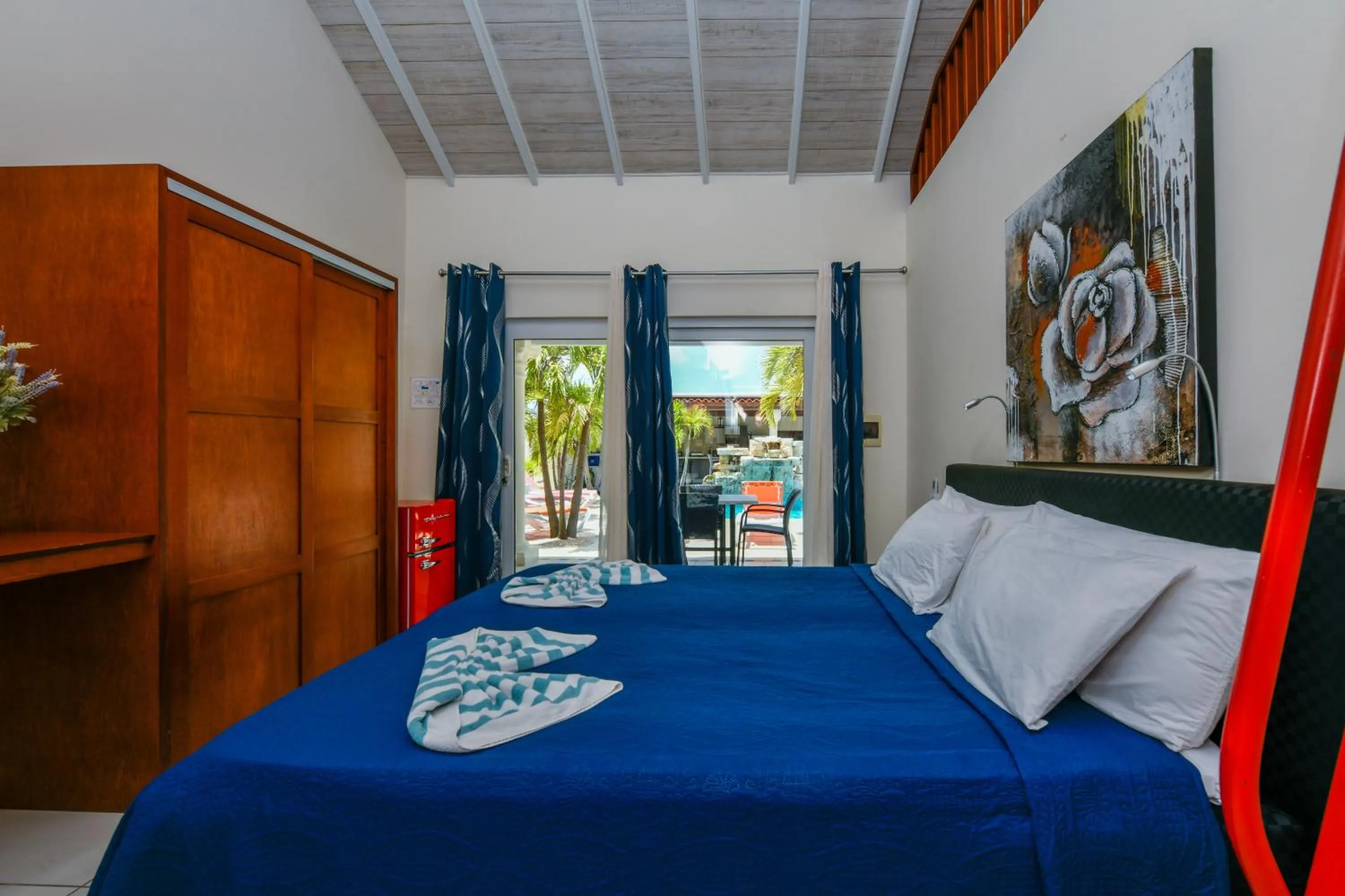 Bed in Boutique Hotel Swiss Paradise Aruba Villas and Suites