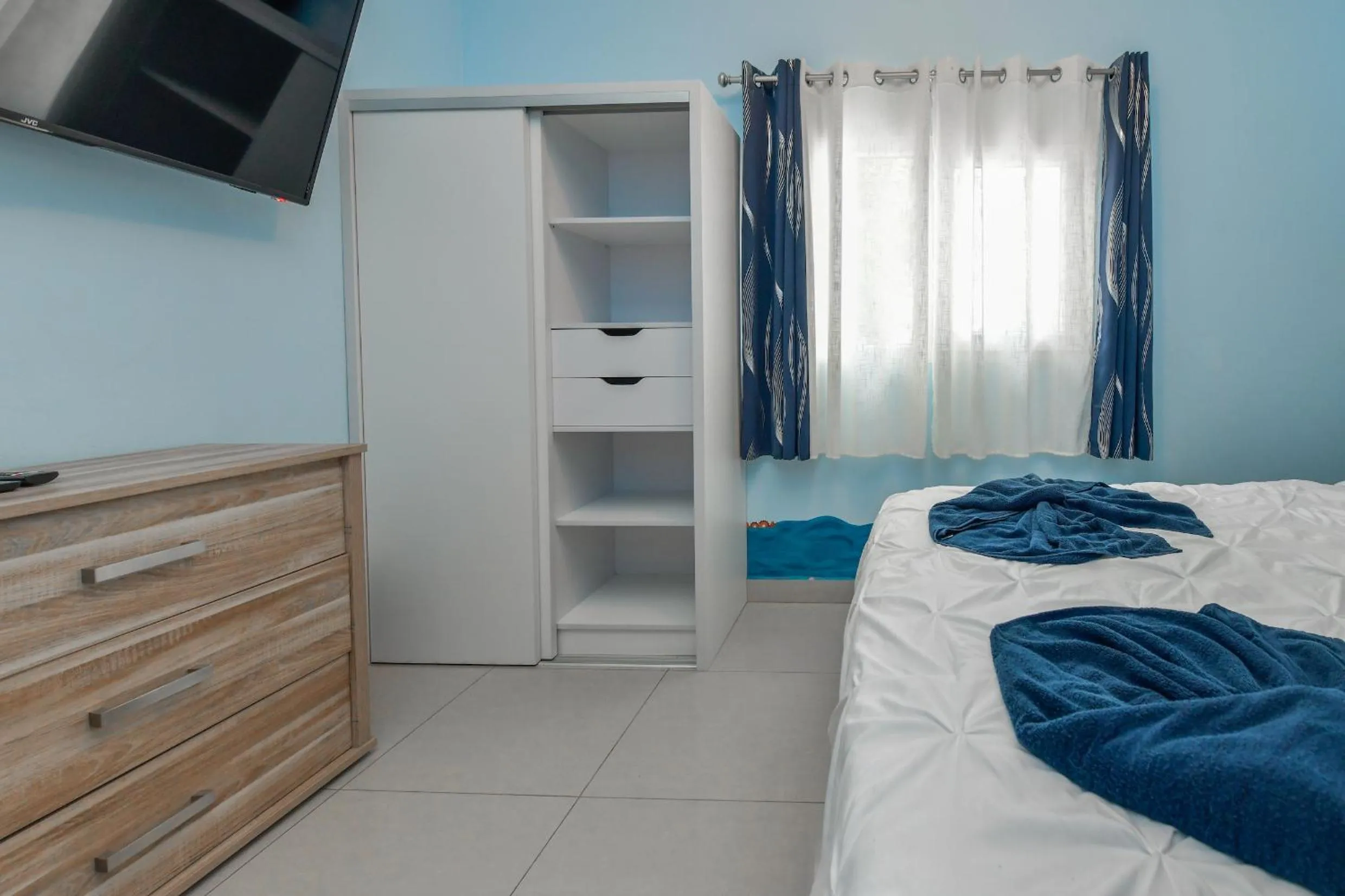 Bed in Boutique Hotel Swiss Paradise Aruba Villas and Suites