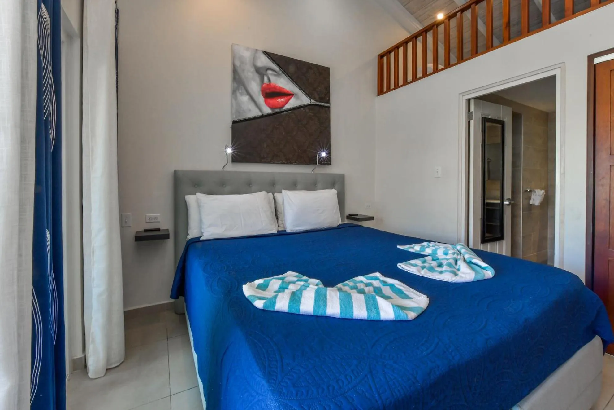 Bed in Boutique Hotel Swiss Paradise Aruba Villas and Suites