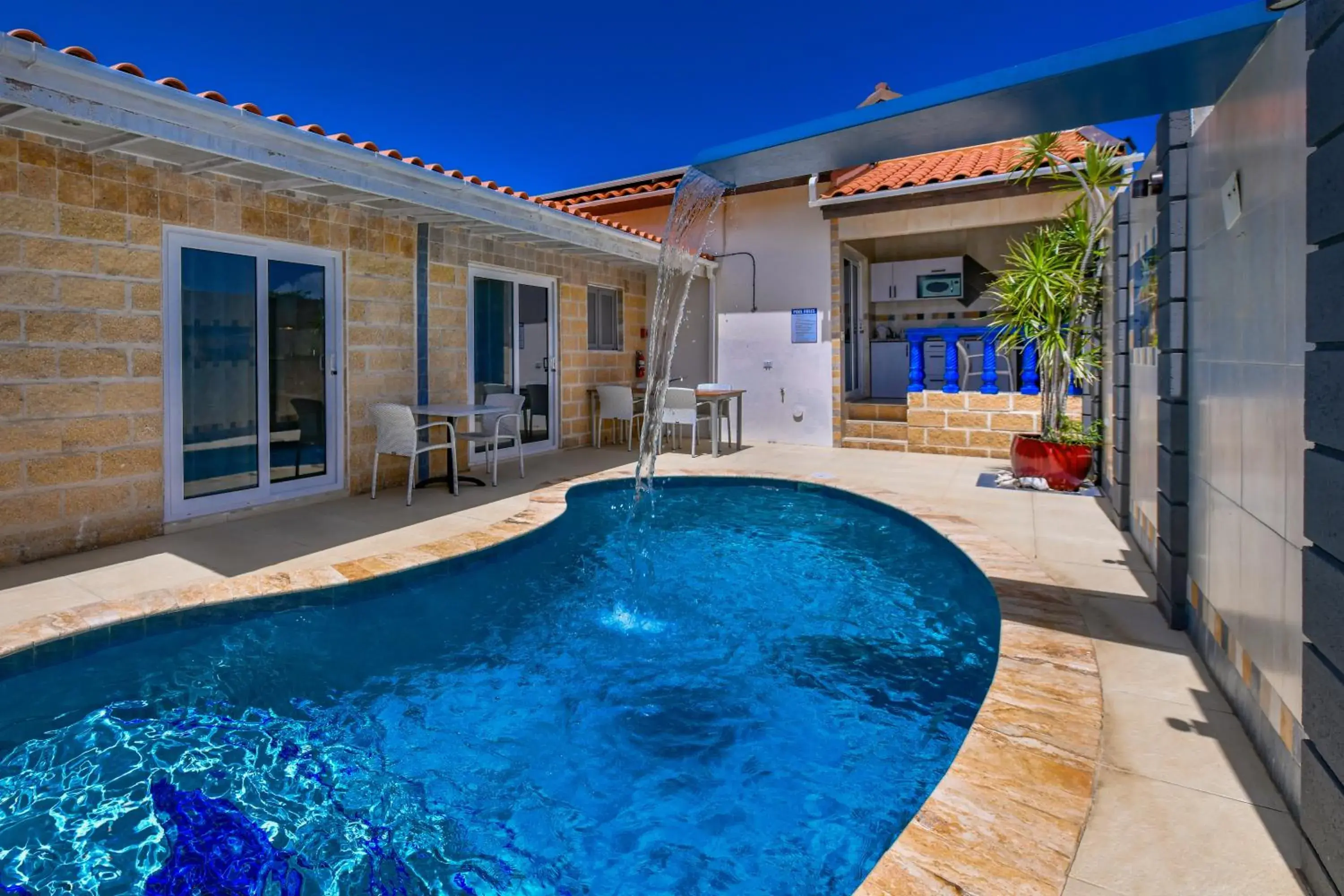 Deluxe One-Bedroom Apartment in Boutique Hotel Swiss Paradise Aruba Villas and Suites Deluxe One-Bedroom Apartment in Boutique Hotel Swiss Paradise Aruba Villas and Suites