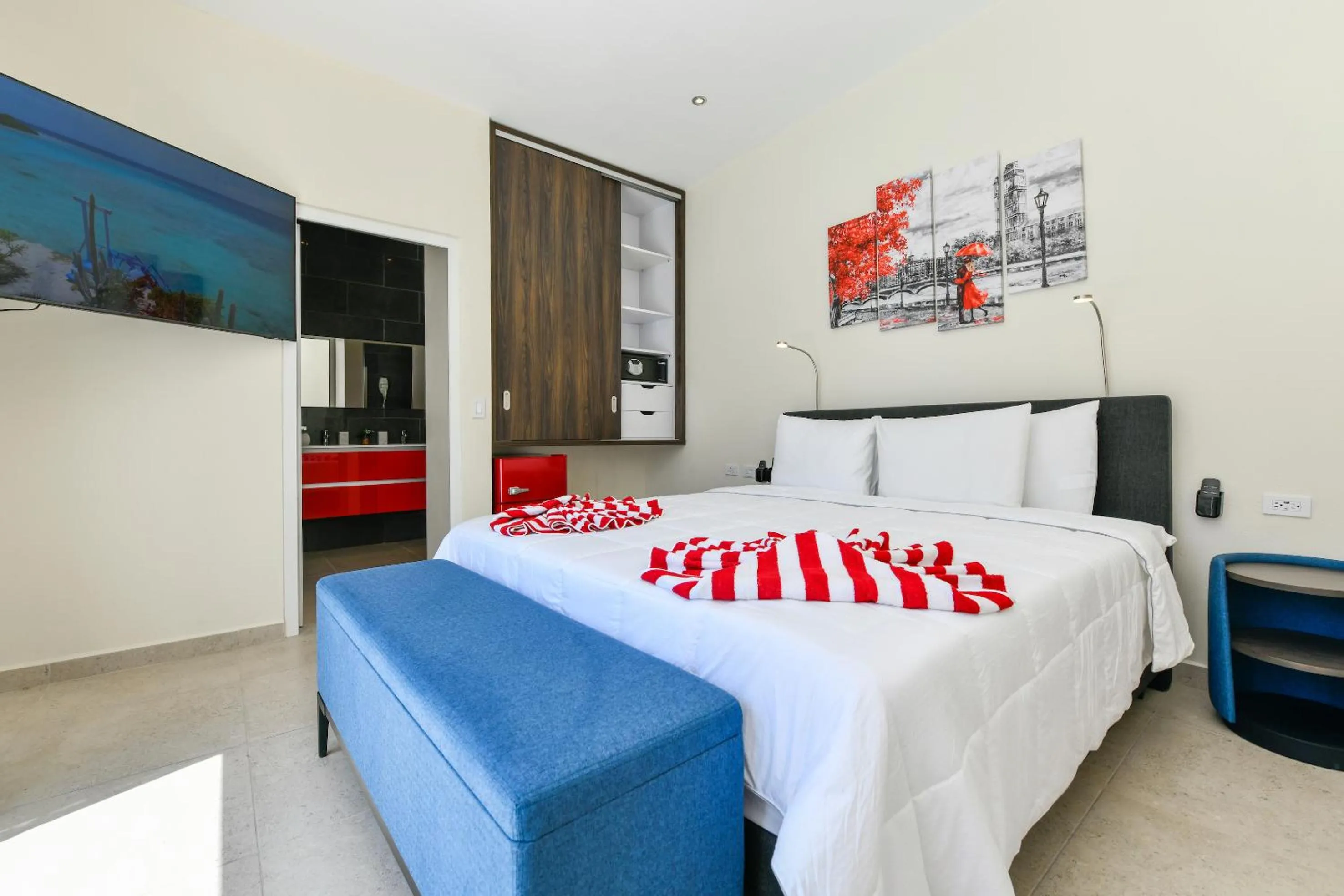 Bed in Boutique Hotel Swiss Paradise Aruba Villas and Suites