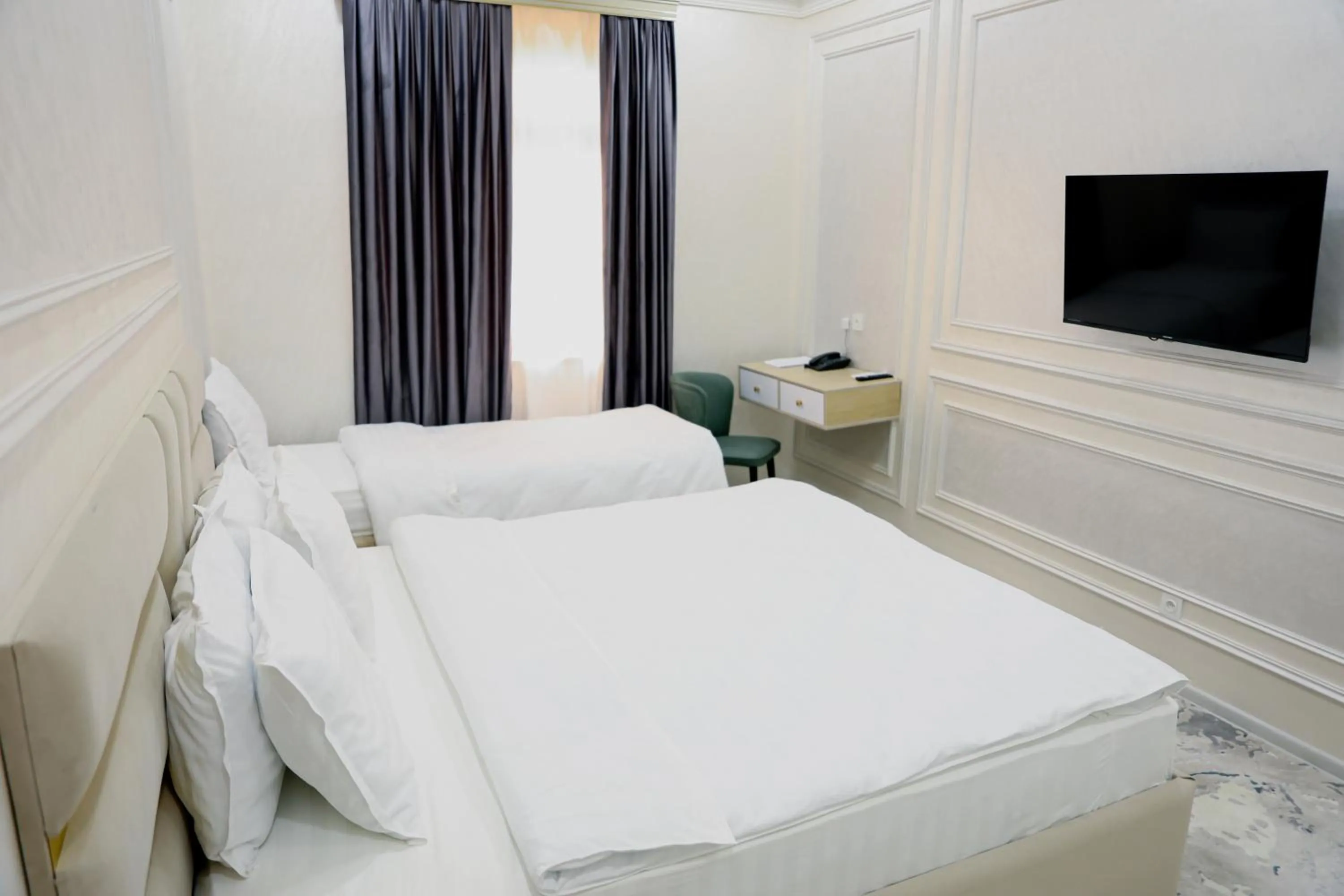 Bed in Ko'k Saroy Plaza Hotel