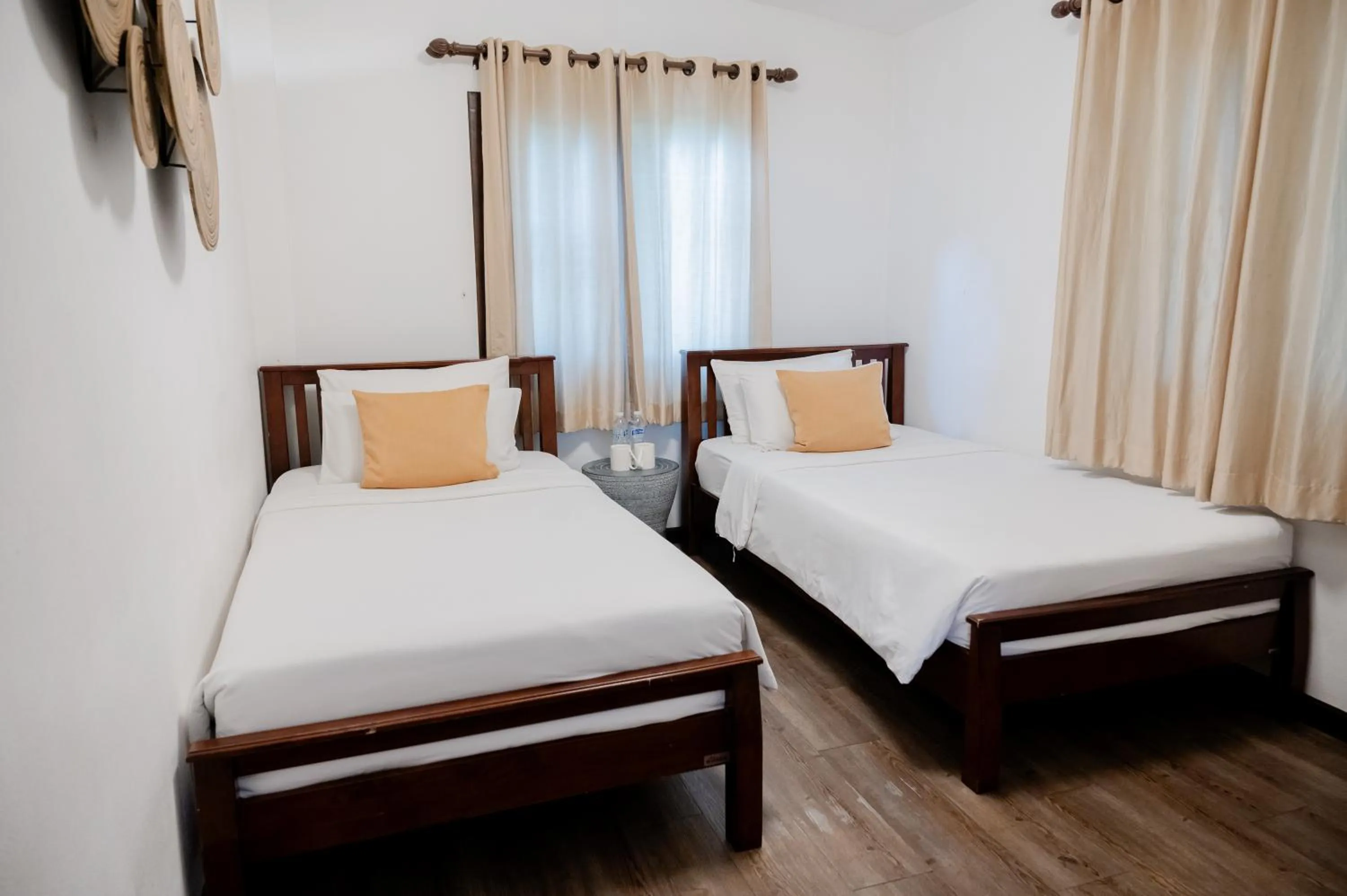 Bed in Tolani Southgate Villa Chiang Mai