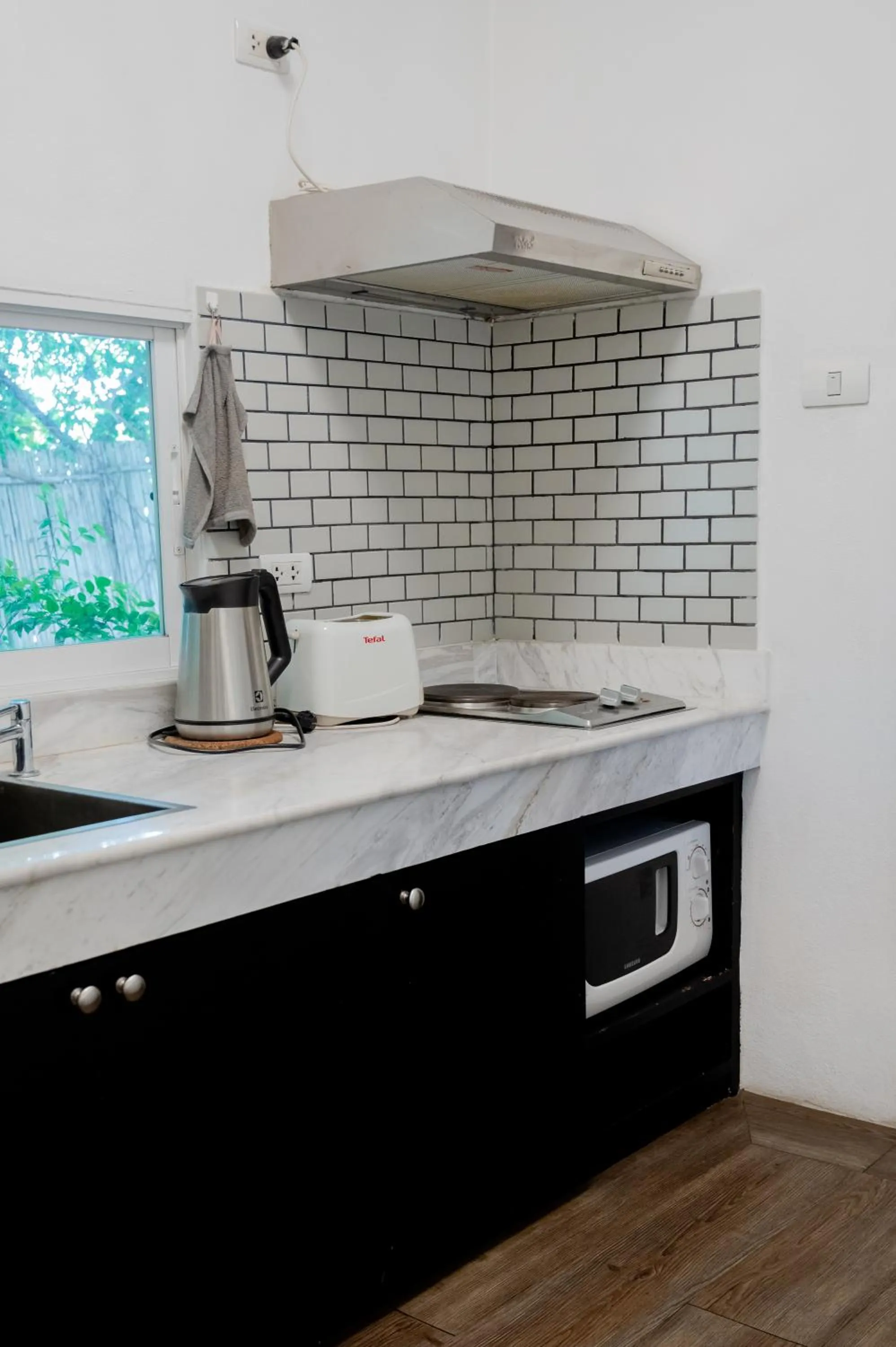 Kitchen or kitchenette in Tolani Southgate Villa Chiang Mai