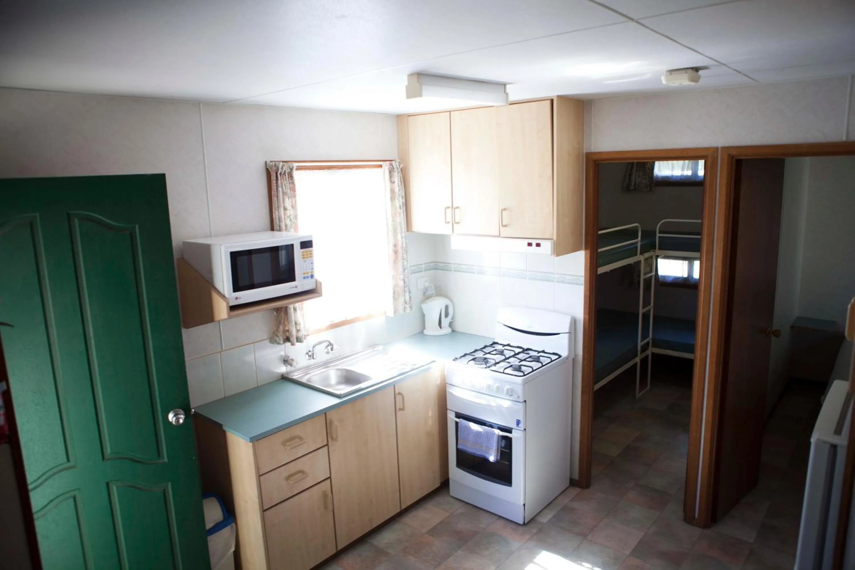 Kitchen or kitchenette in Strayleaves Caravan Park