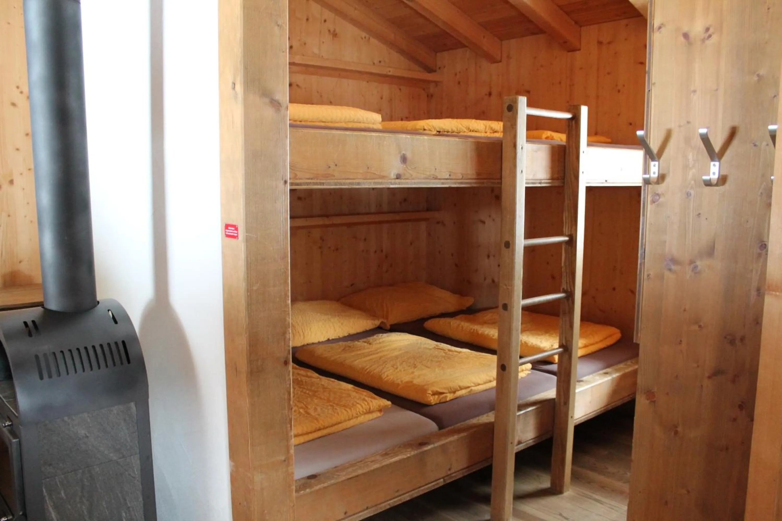 Bed in Hüttenhotel Husky Lodge