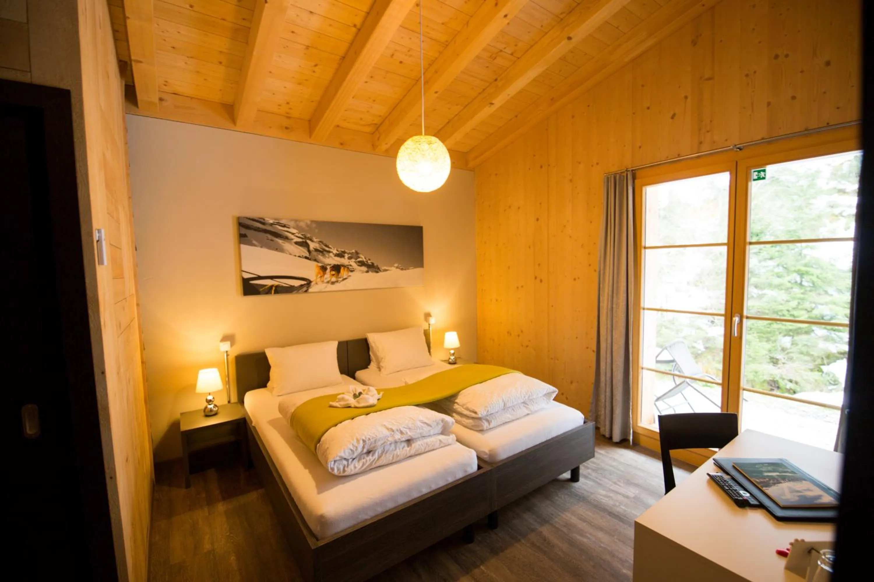 Bed in Hüttenhotel Husky Lodge