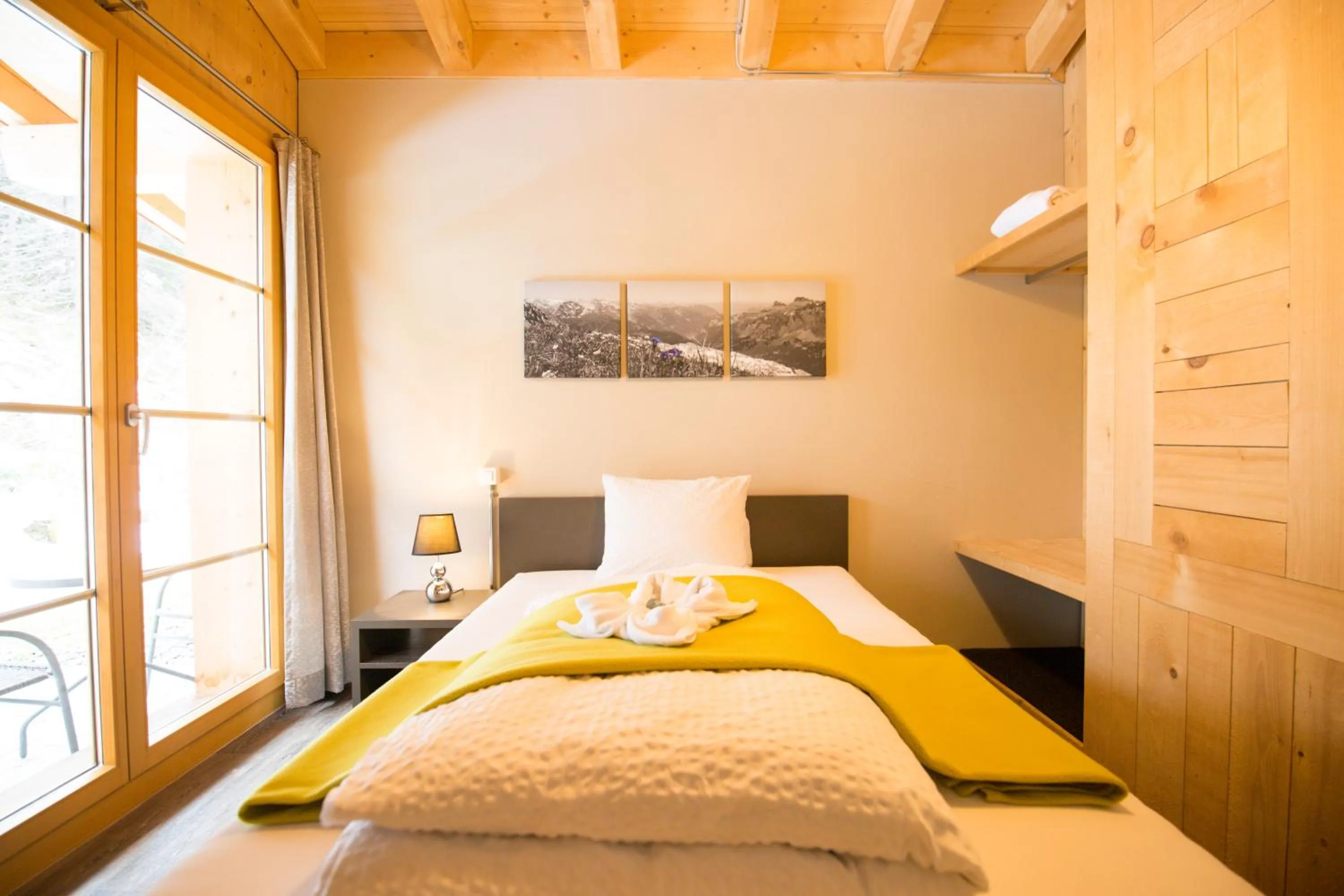 Bed in Hüttenhotel Husky Lodge