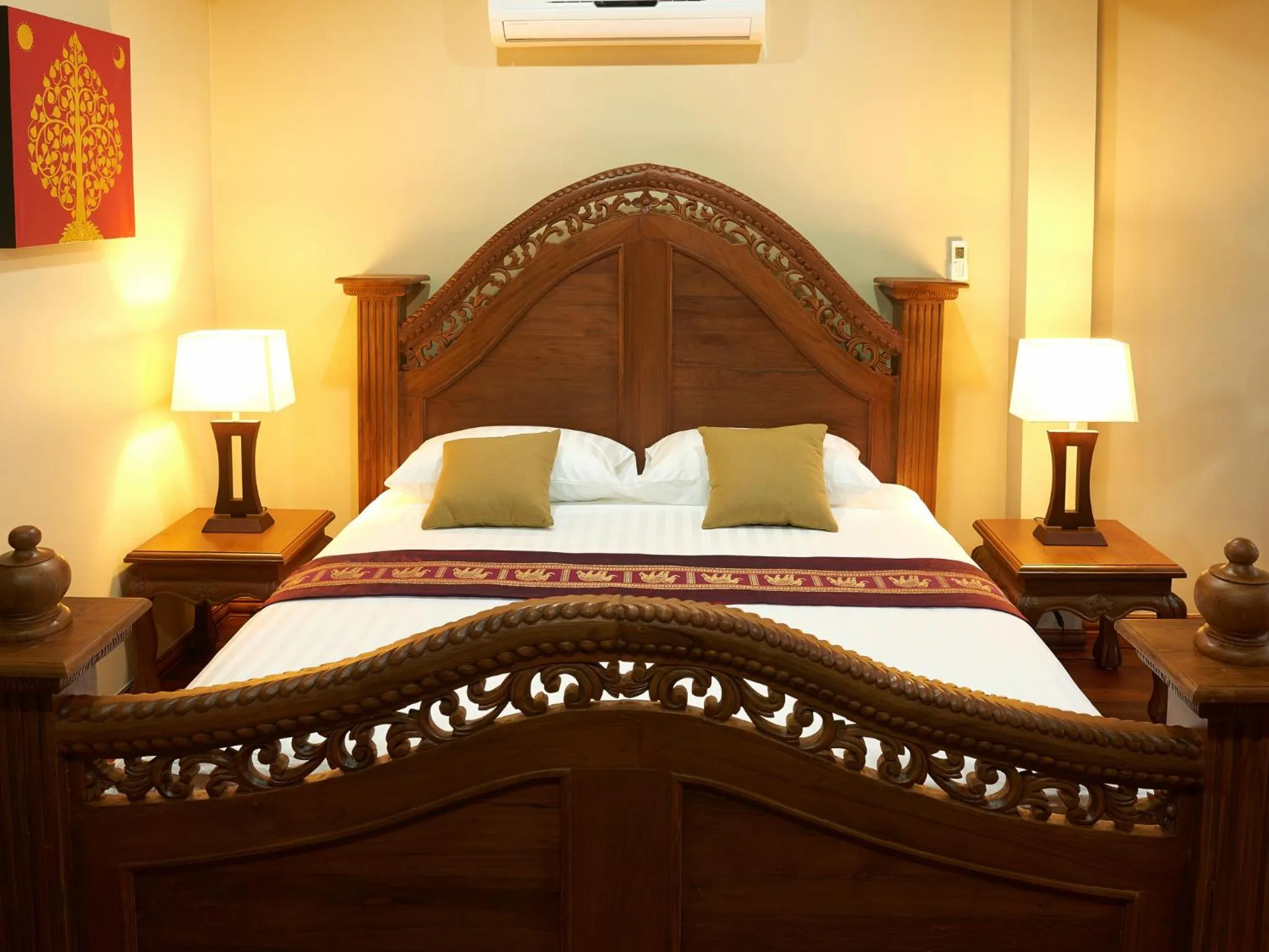 Bed in Sara Beachfront Boutique Resort