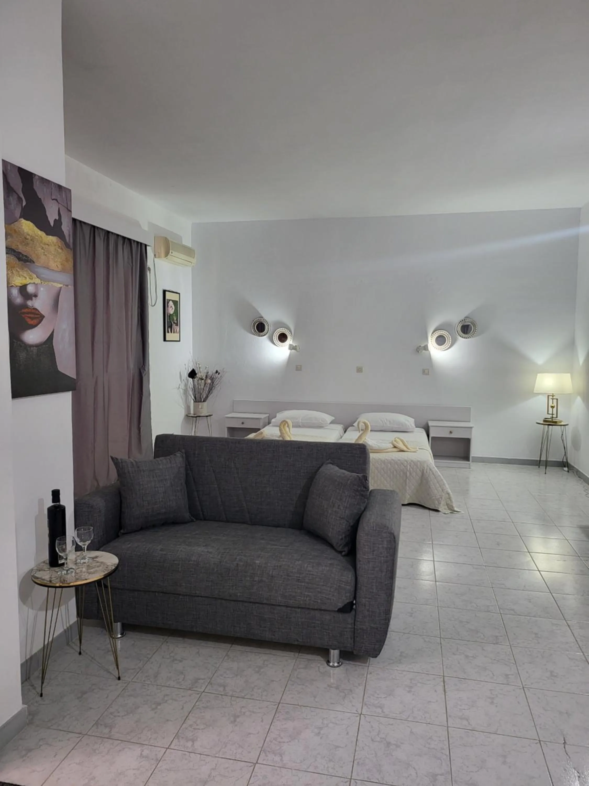 Seating area, Bed in Pyrgos Hotel Apartments