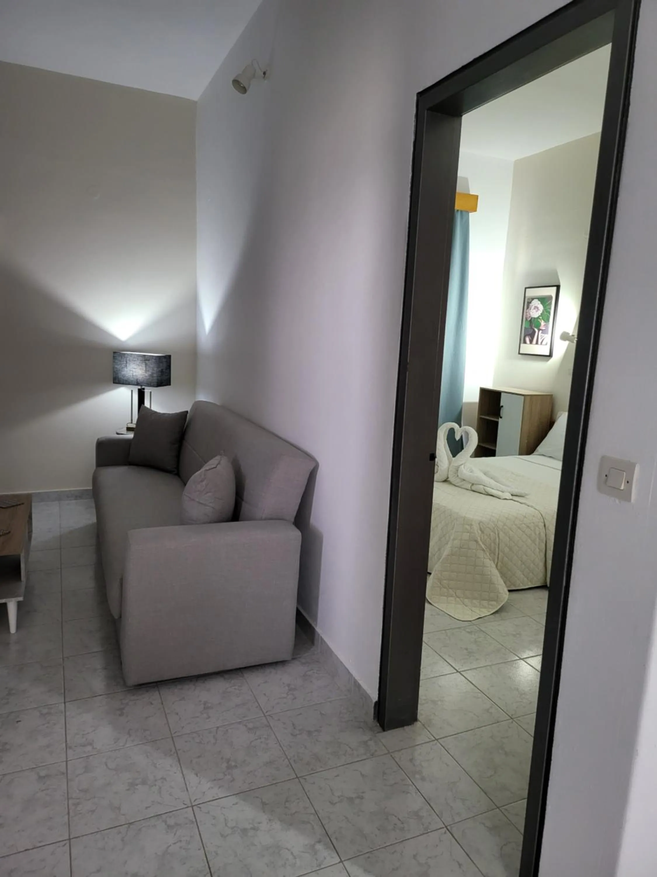 Living room, Bed in Pyrgos Hotel Apartments