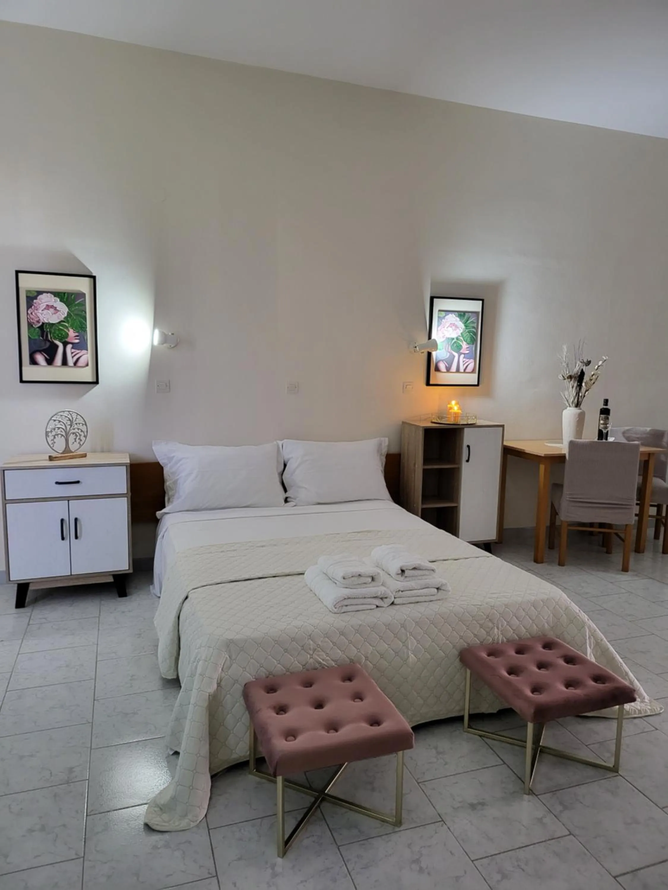 Bed in Pyrgos Hotel Apartments