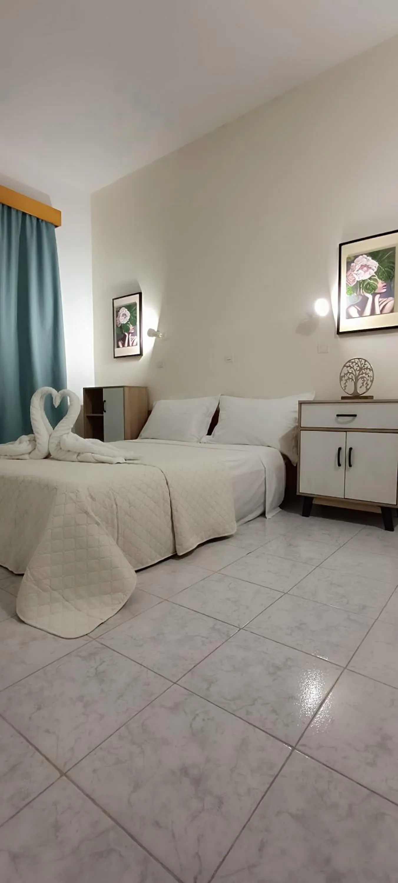 Bed in Pyrgos Hotel Apartments