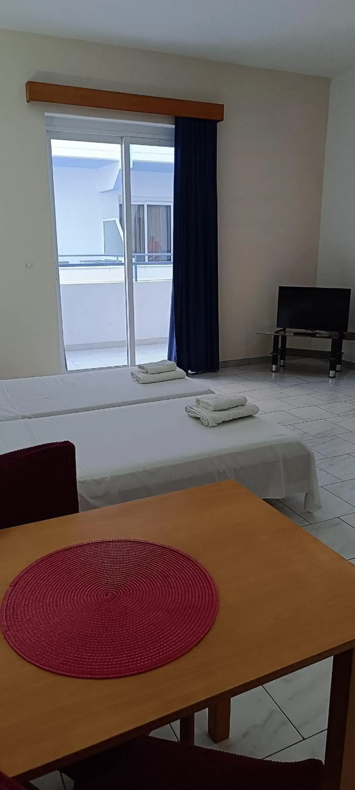 Economy Twin Room in Pyrgos Hotel Apartments Economy Twin Room in Pyrgos Hotel Apartments