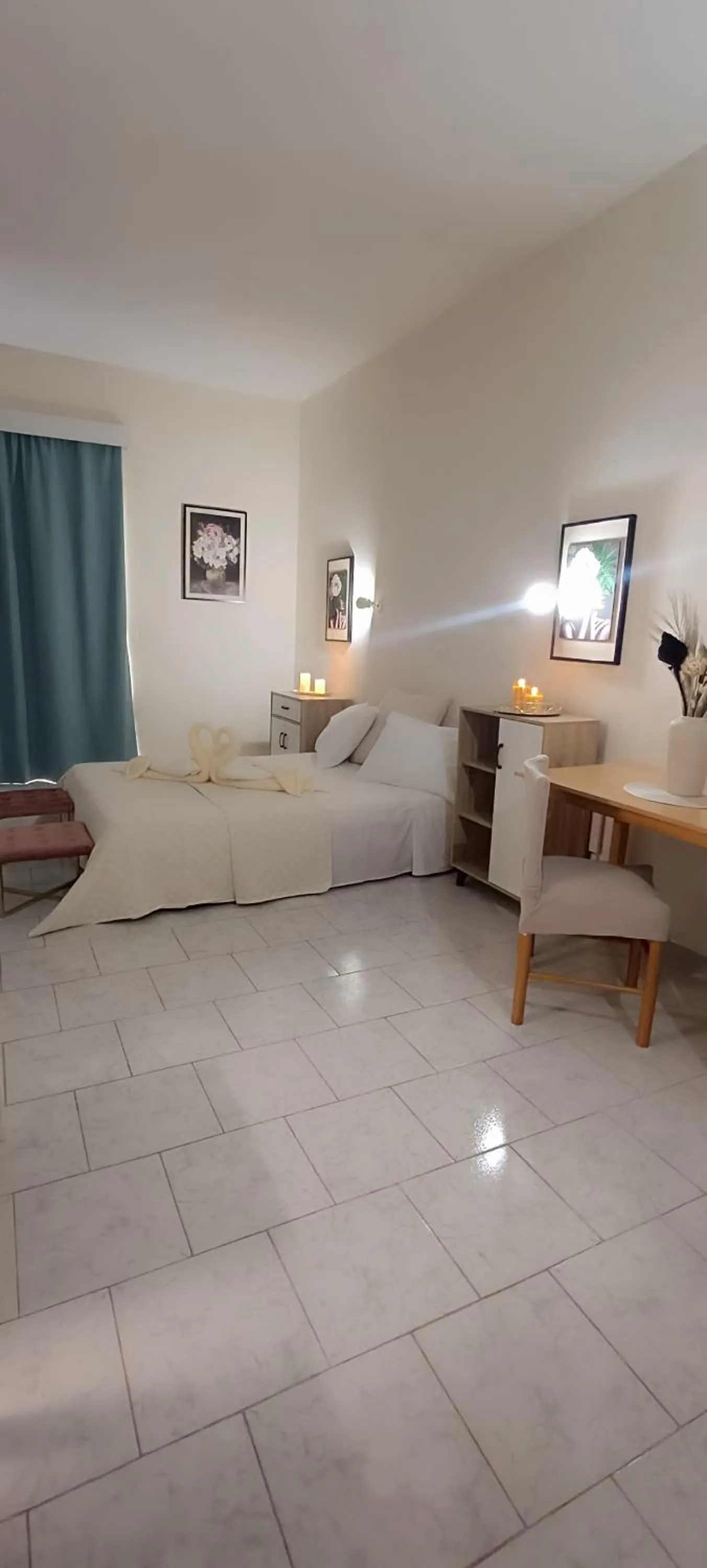 Bed in Pyrgos Hotel Apartments