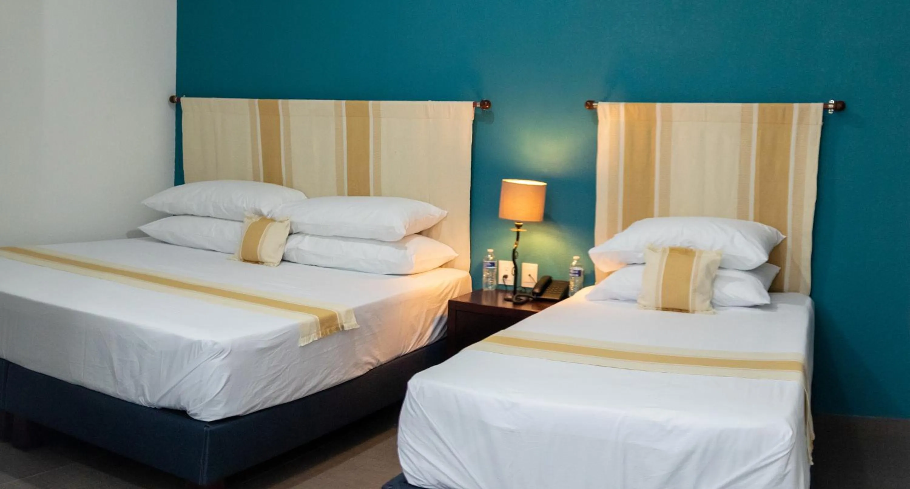 Bed in Nueve Agaves Hotel