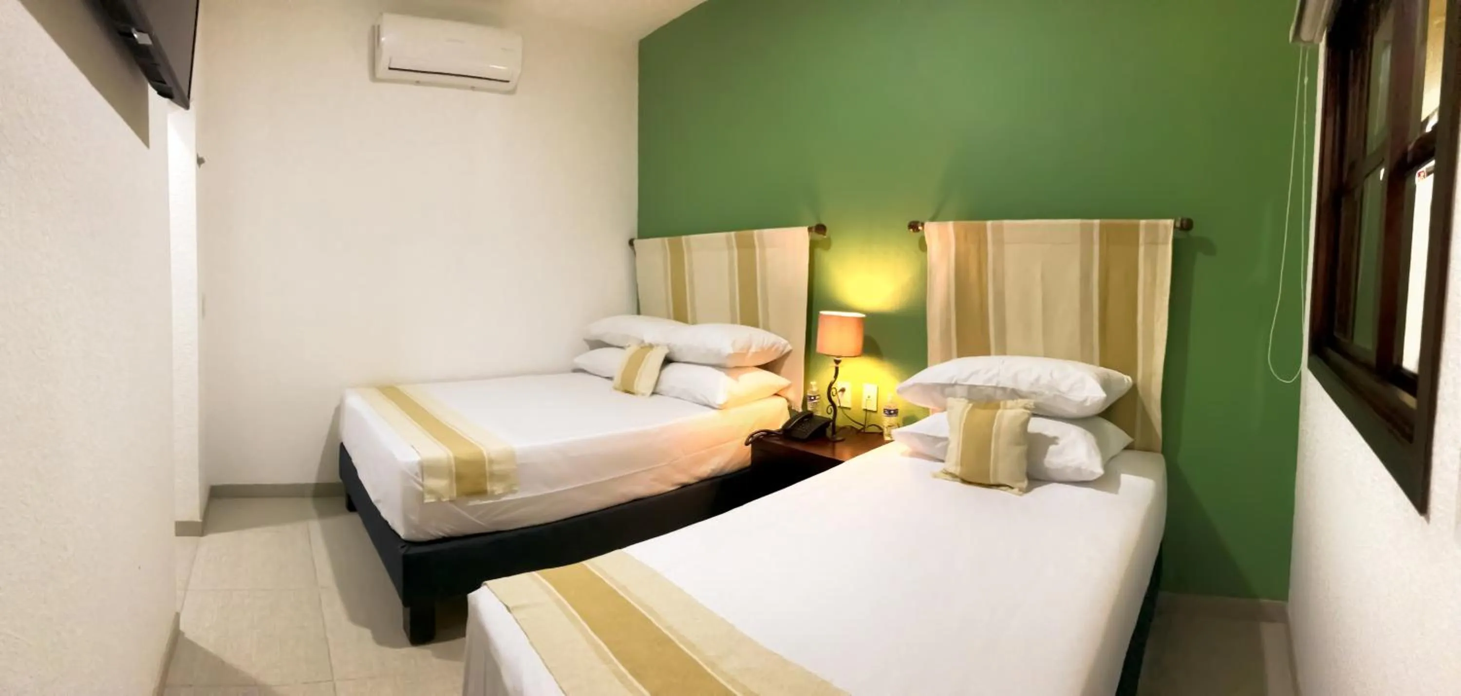 Bed in Nueve Agaves Hotel