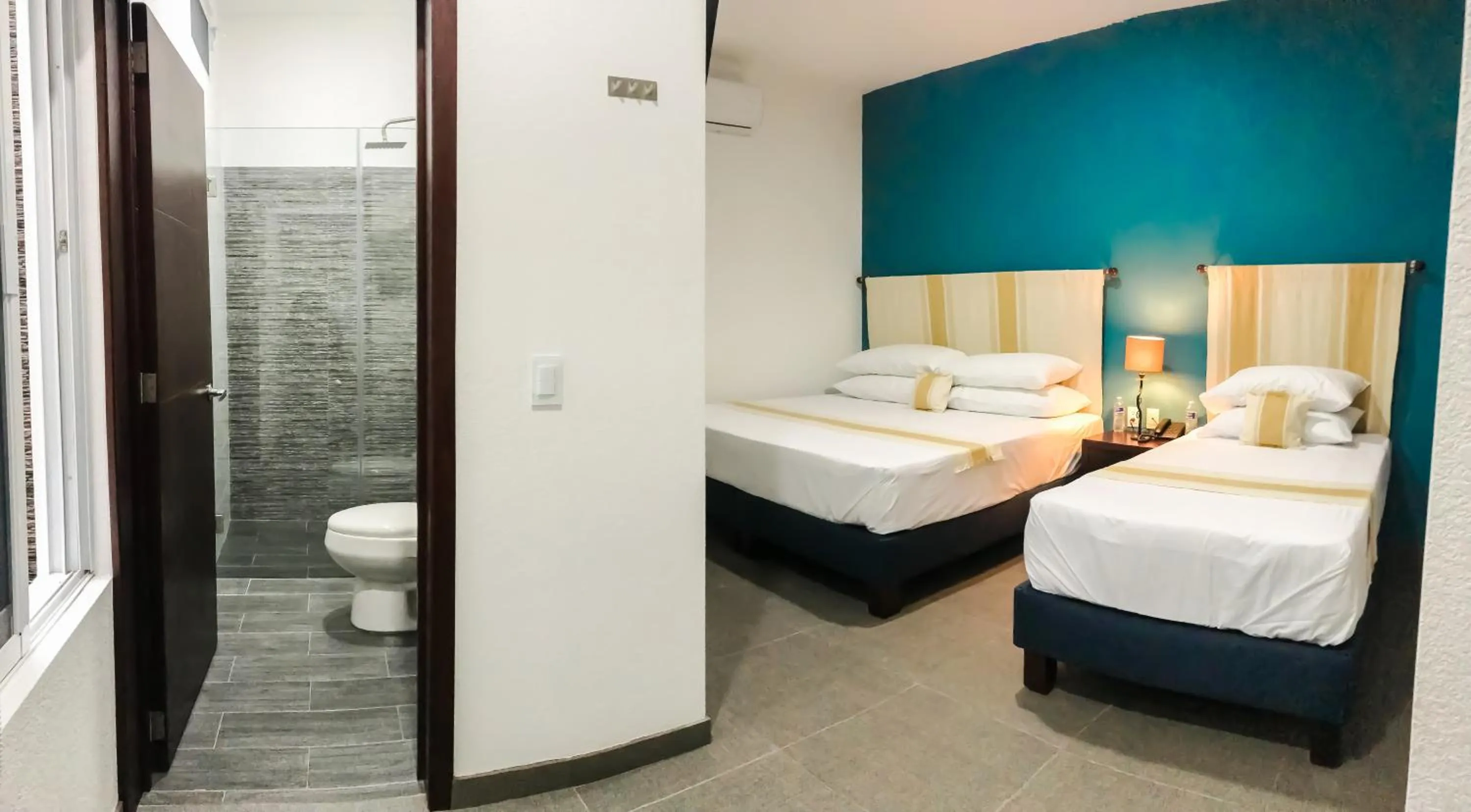 Bed in Nueve Agaves Hotel