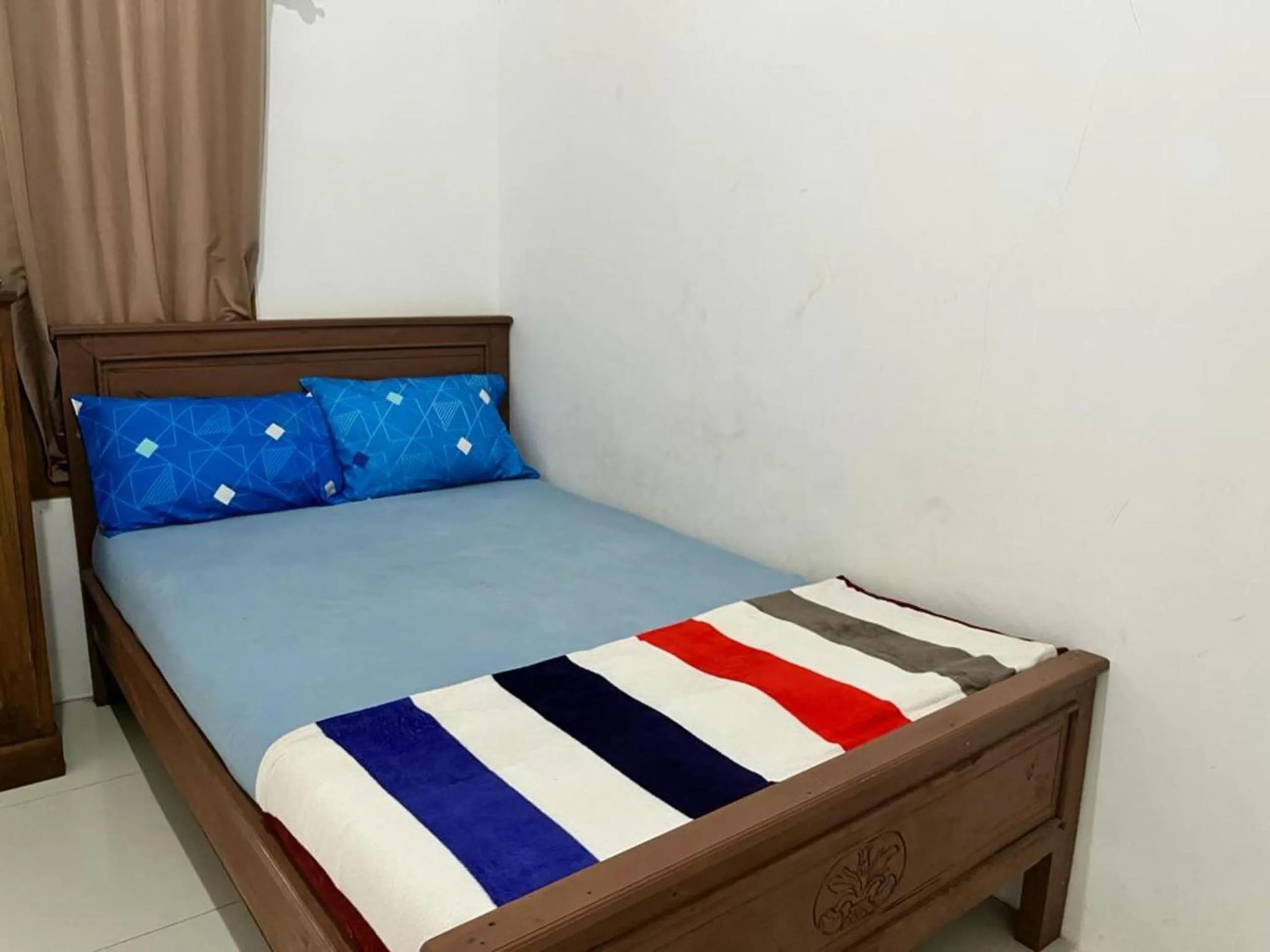 Bedroom in OYO 93784 Kost Bu Eli Syariah