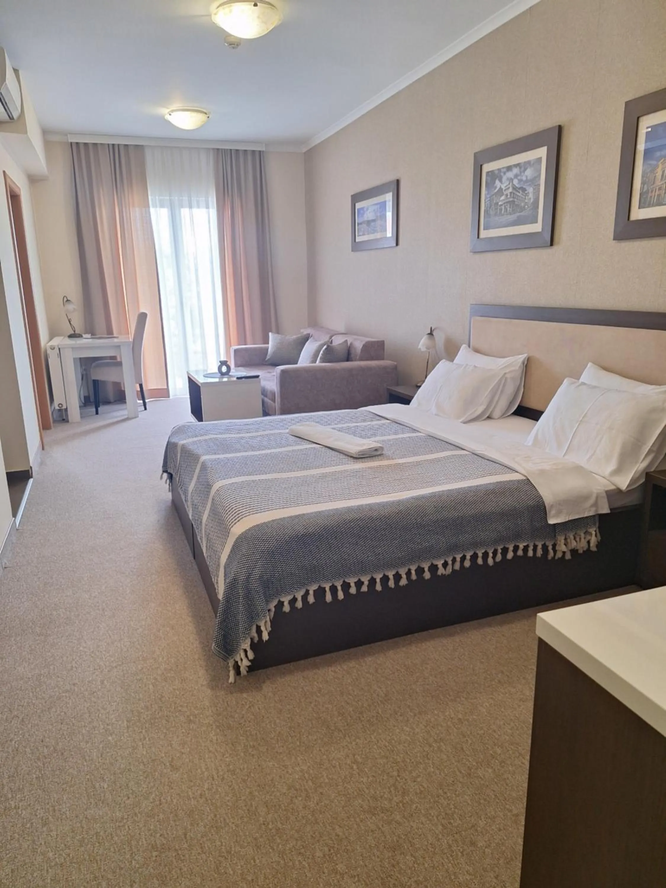 Bed in Garni Hotel Ema