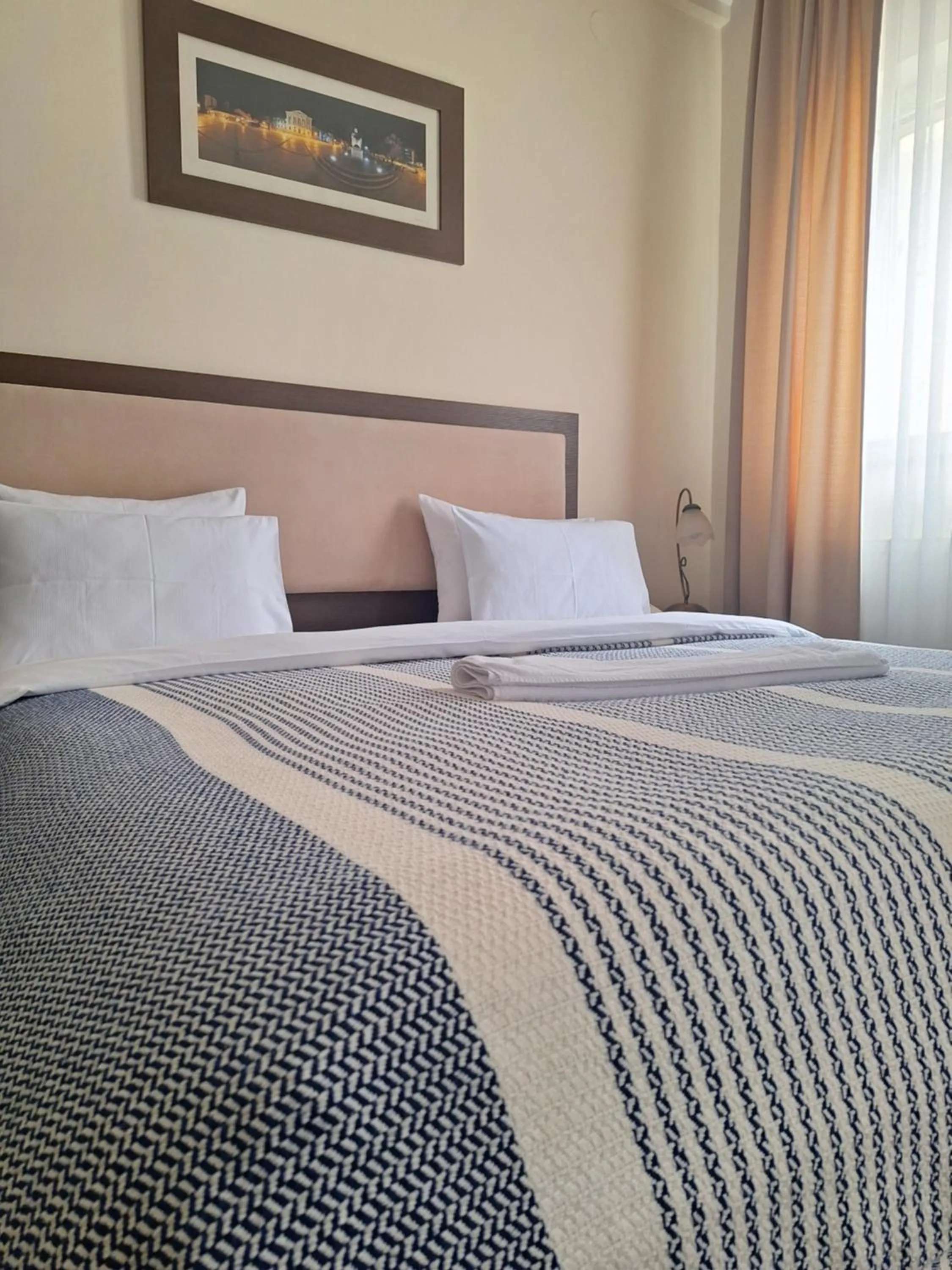 Bed in Garni Hotel Ema