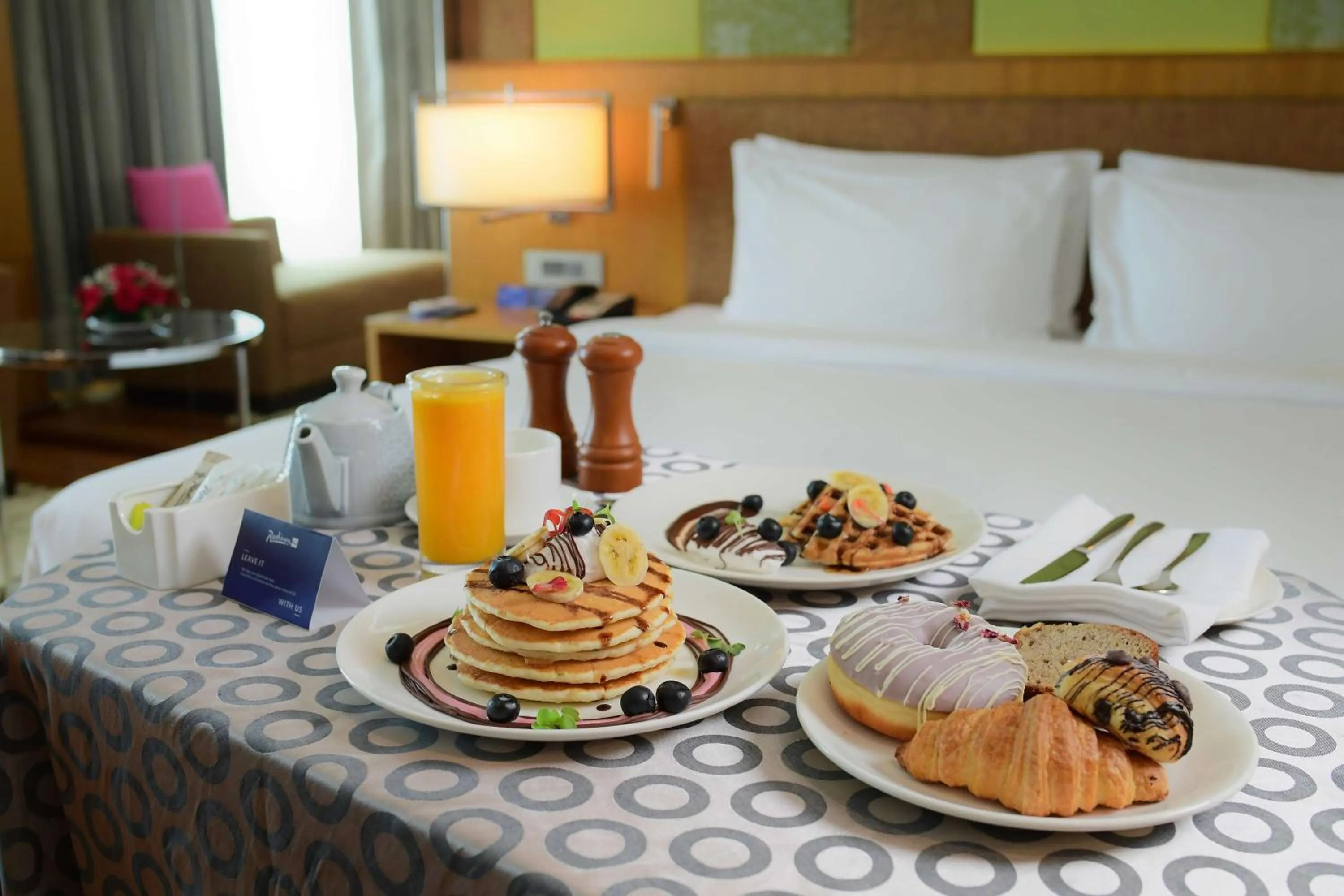 Food and drinks, Bed in Radisson Blu Hotel Guwahati