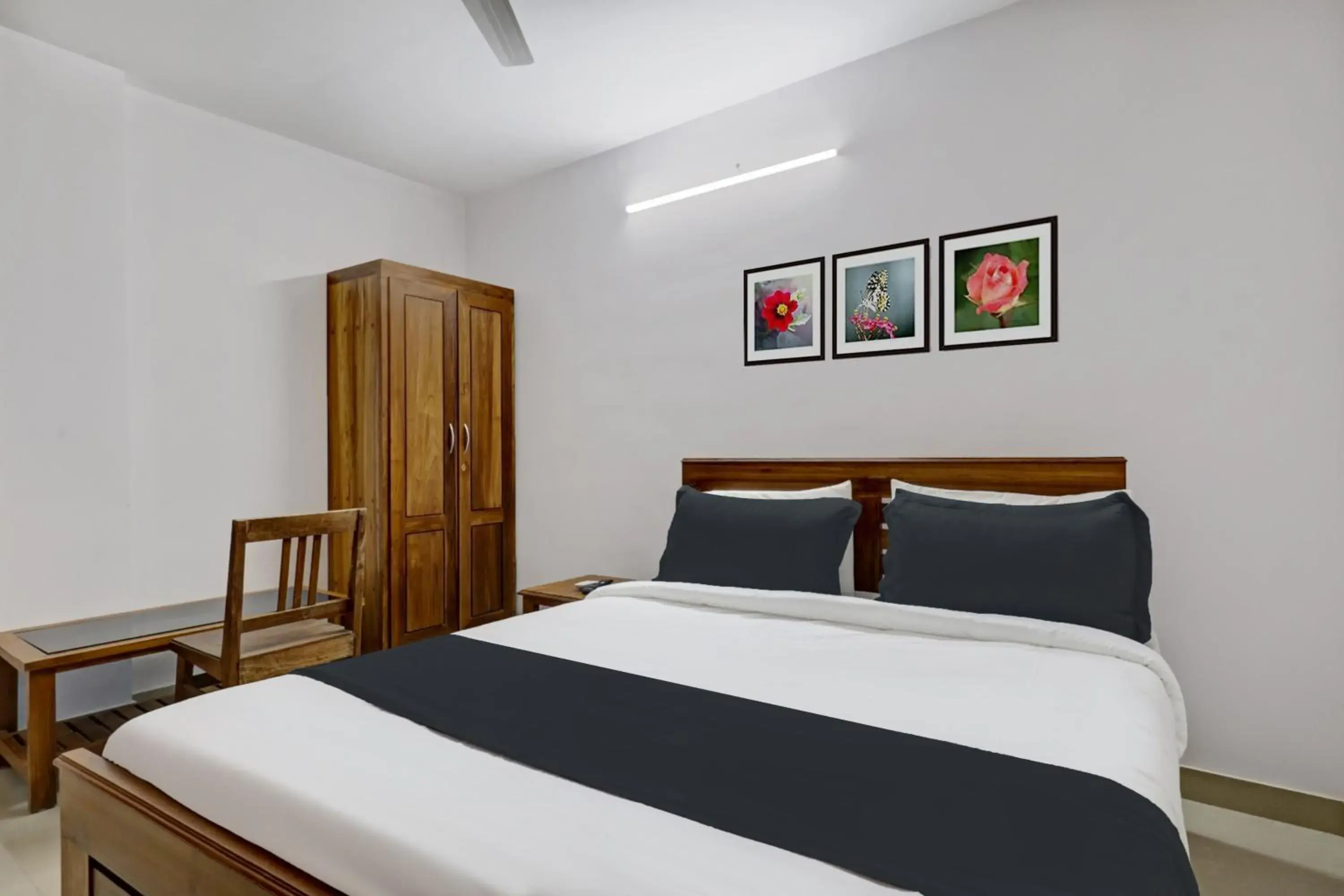 Classic Triple Room - single occupancy in Super Hotel O Anayara Near Lulu Mall formerly Timber Residency Classic Triple Room - single occupancy in Super Hotel O Anayara Near Lulu Mall formerly Timber Residency