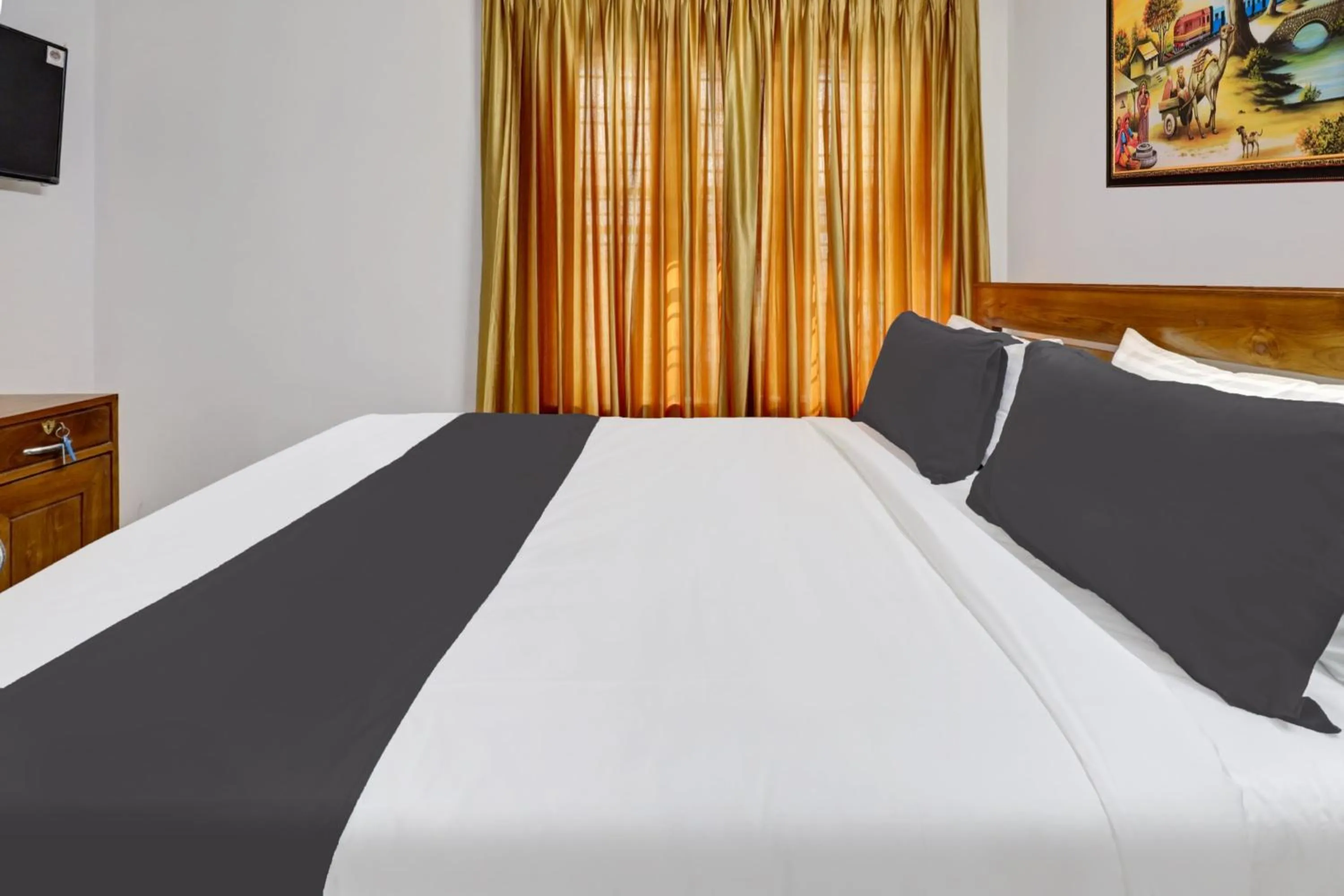 Bedroom, Bed in Super Hotel O Anayara Near Lulu Mall formerly Timber Residency