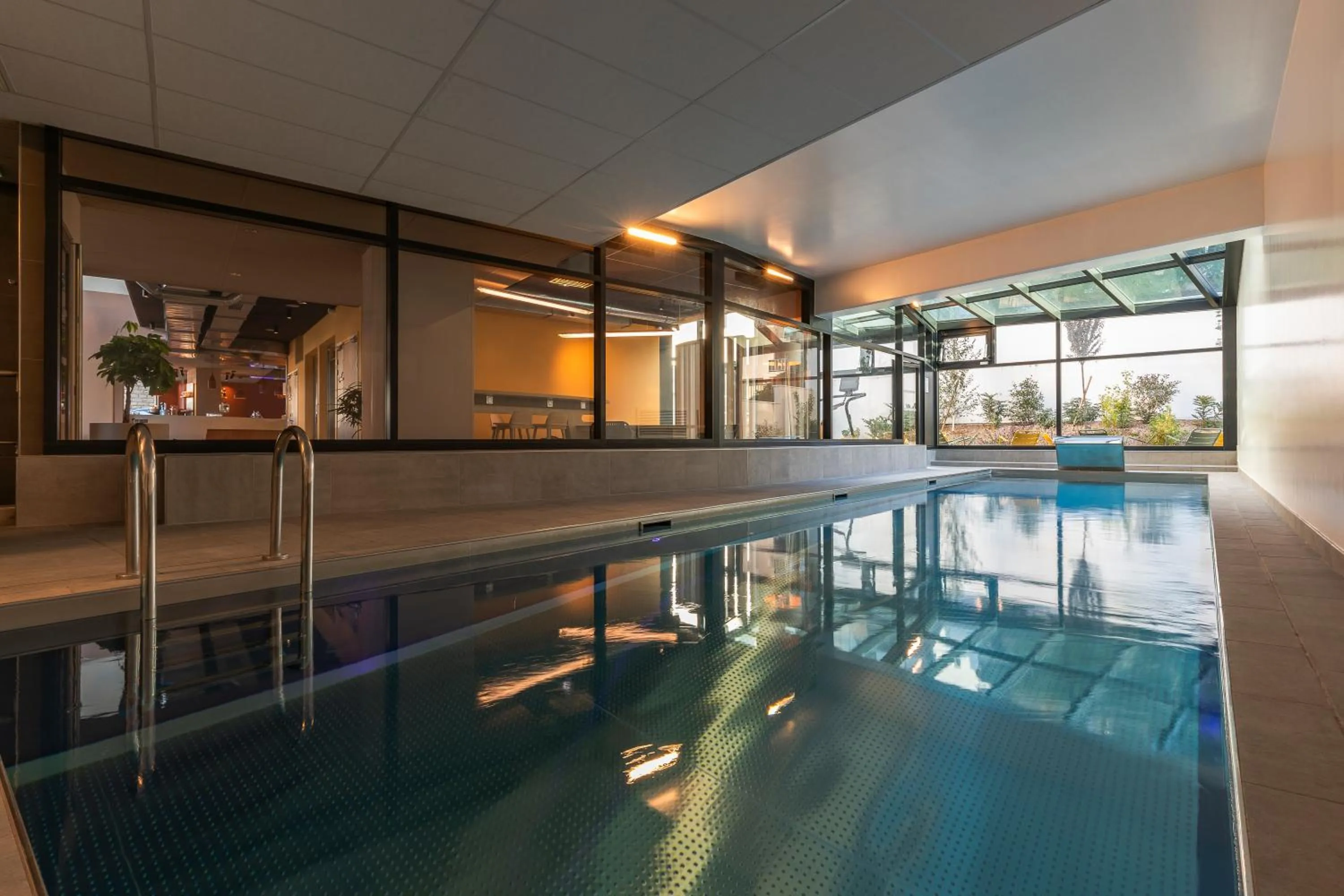 Swimming pool in Nomad Hotel Dijon