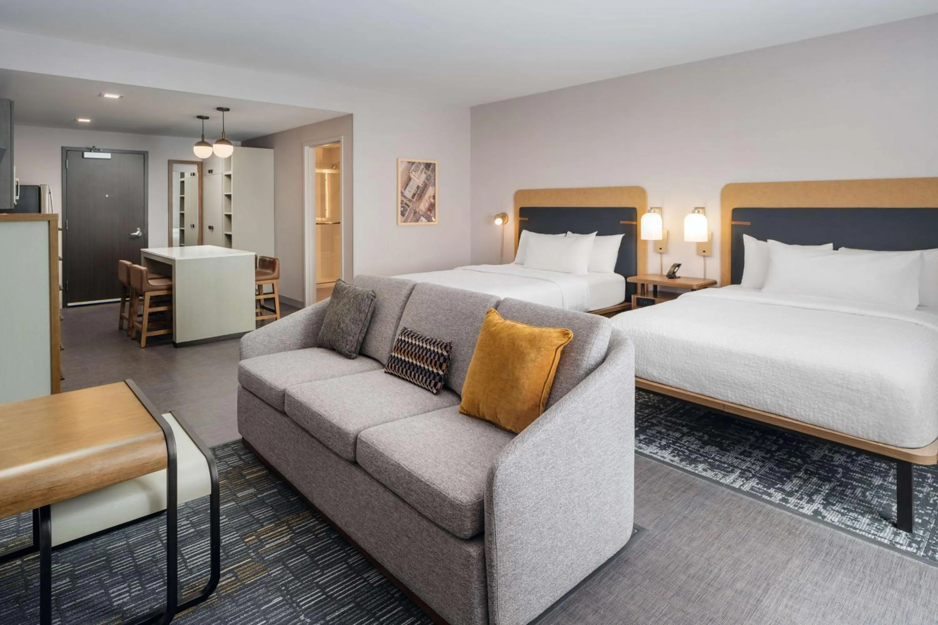 Living room, Bed in Homewood Suites By Hilton Raleigh Downtown